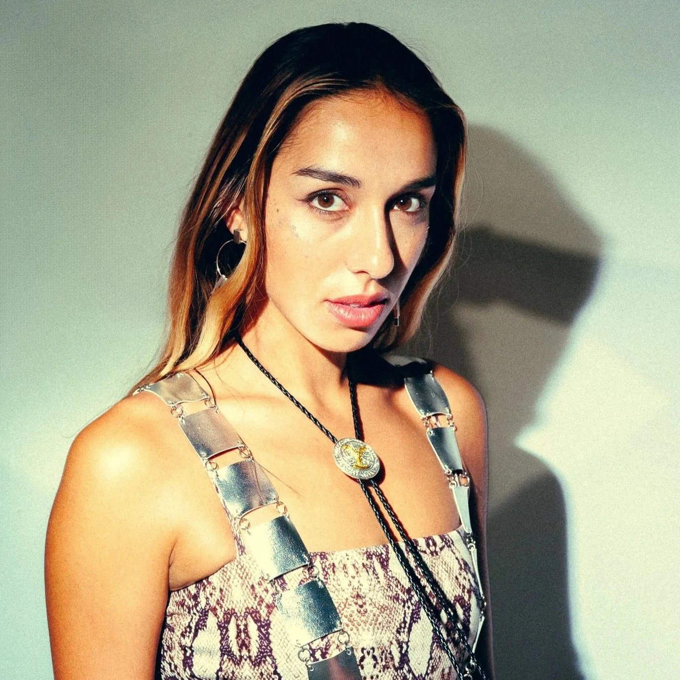 Portrait of Claudia Rose Walder Martinez - snakeskin top