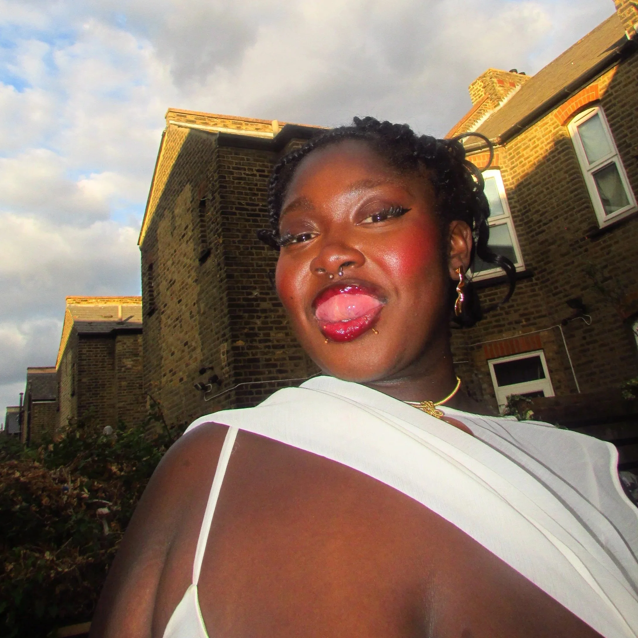 Portrait of Ola Oguntuase - cheeky expression
