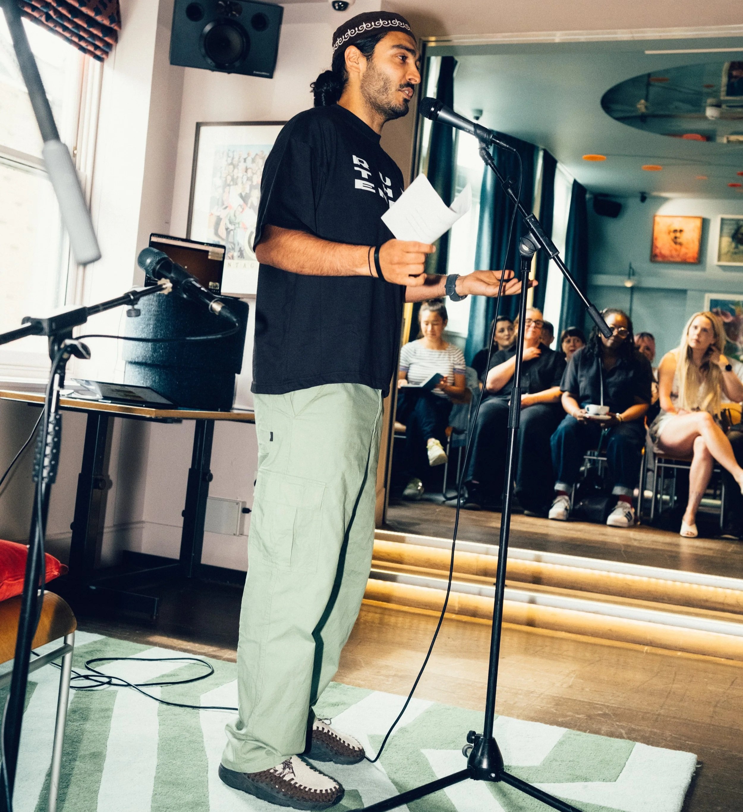 Host Moeed addressing the audience