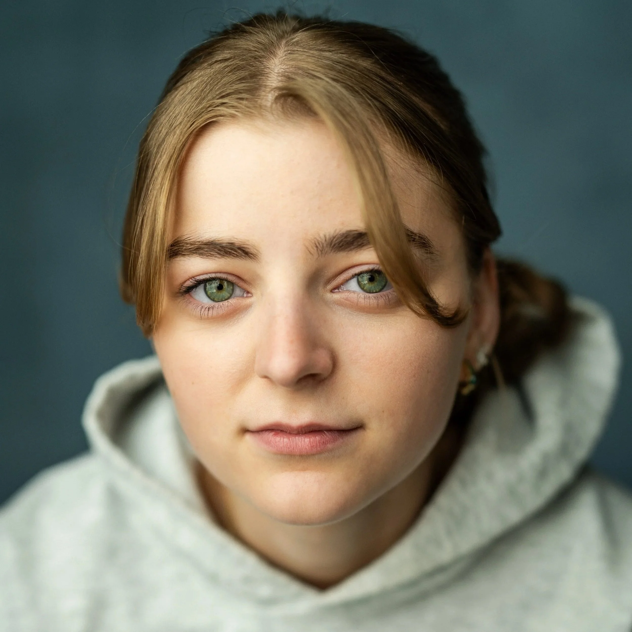 Portrait of Sophie Moss - grey hoodie