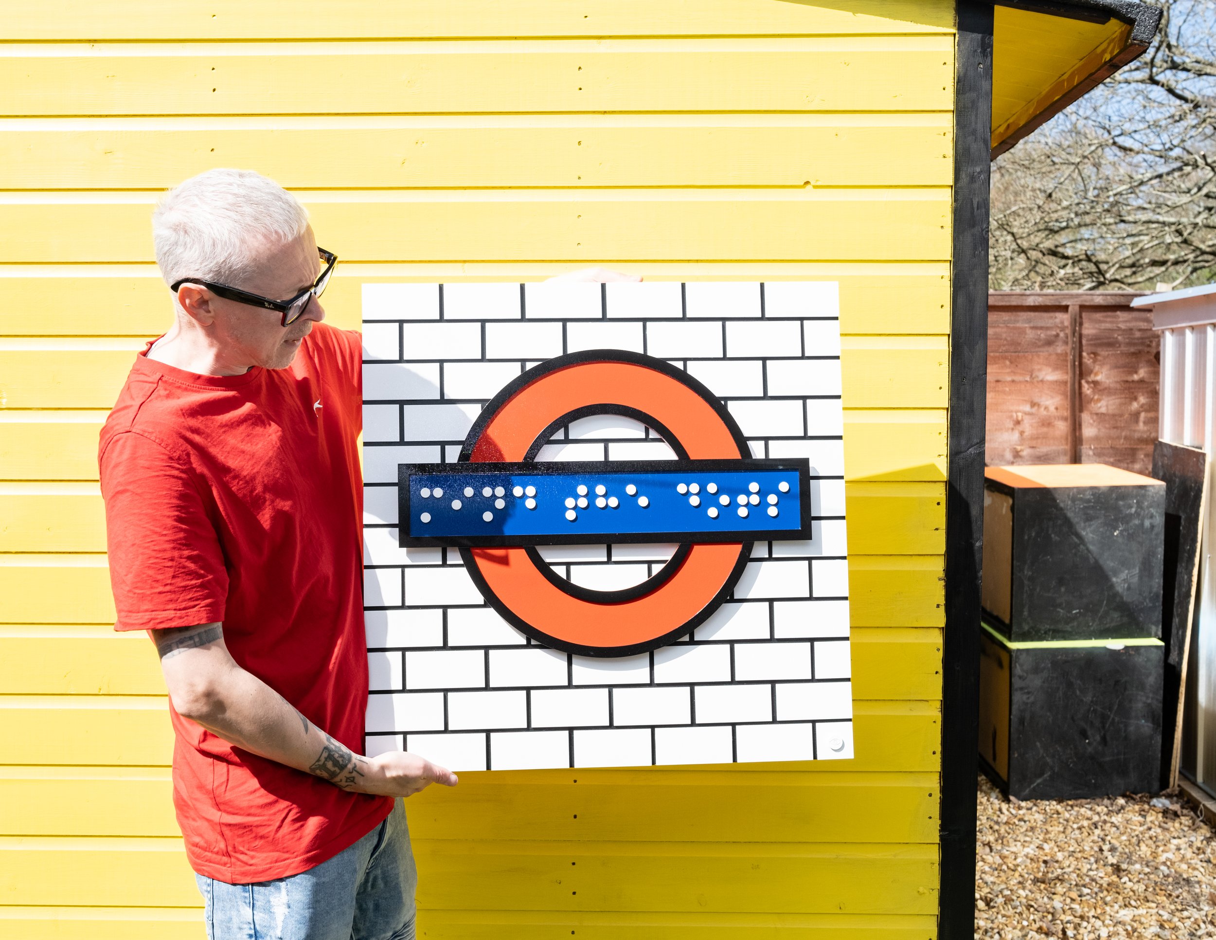 Clarke Reynolds portrait - tube sign