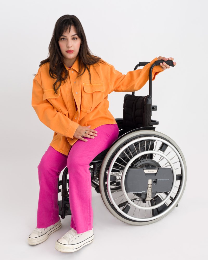 Portrait of Roisin Clear - orange shirt