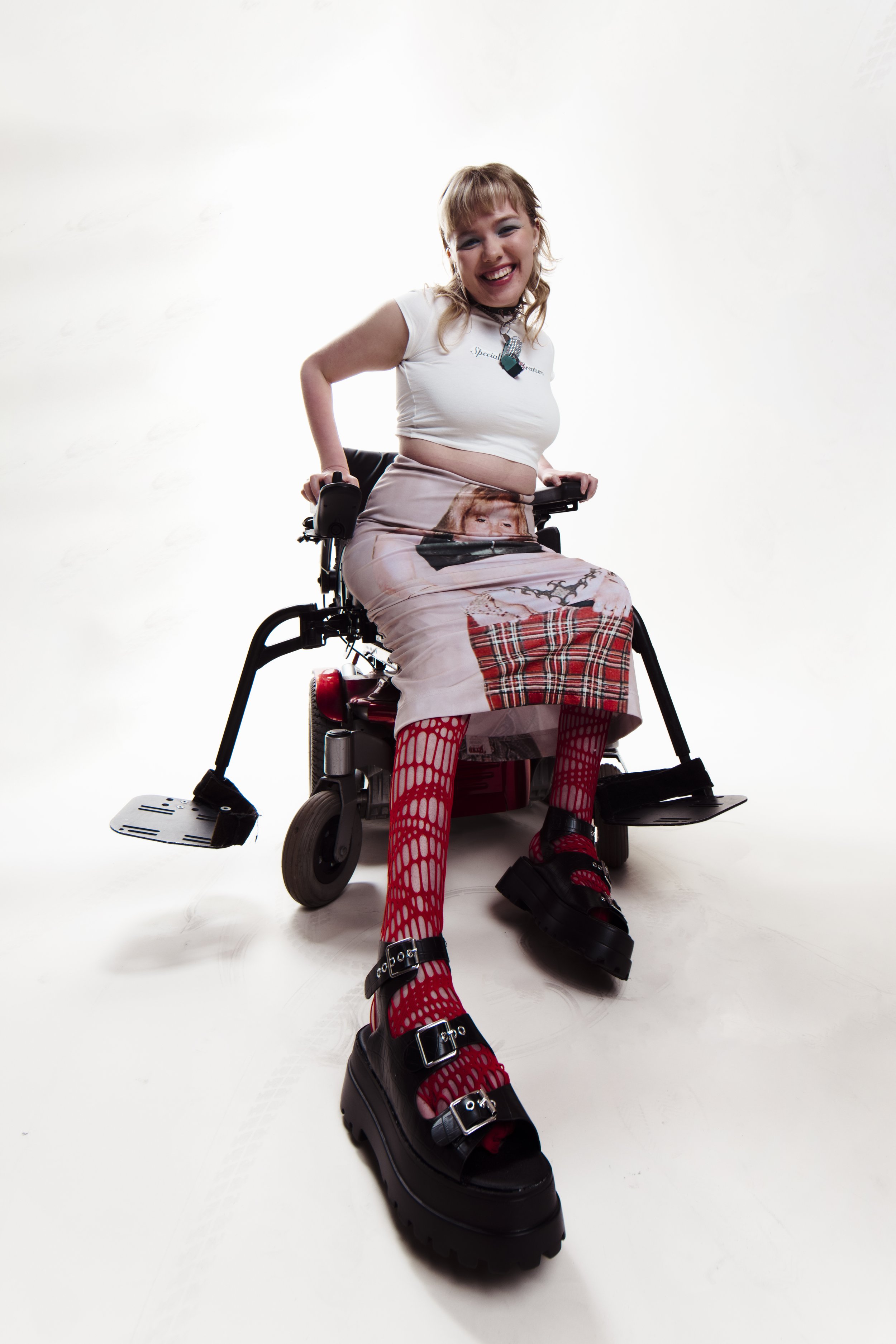 Portrait of Emma Lines - tartan skirt