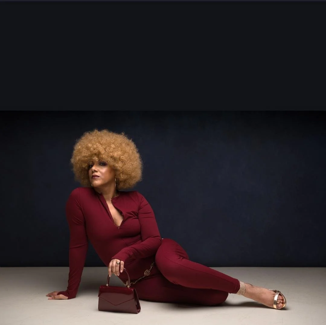 Portrait of Andie Willis - blonde afro