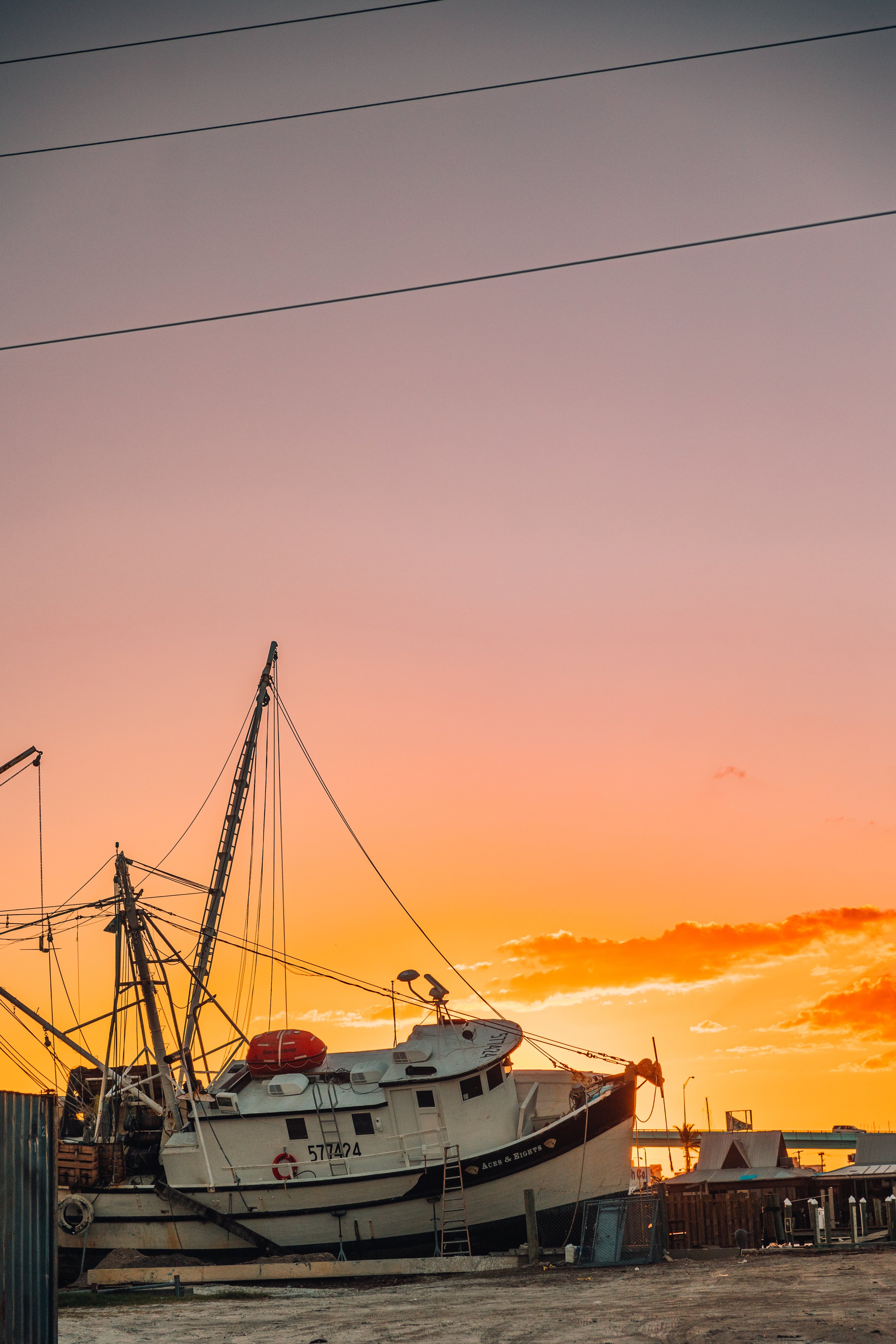 shrimping boats on the land after Hurricane Ian damage in Fort Lauderdale, Florida