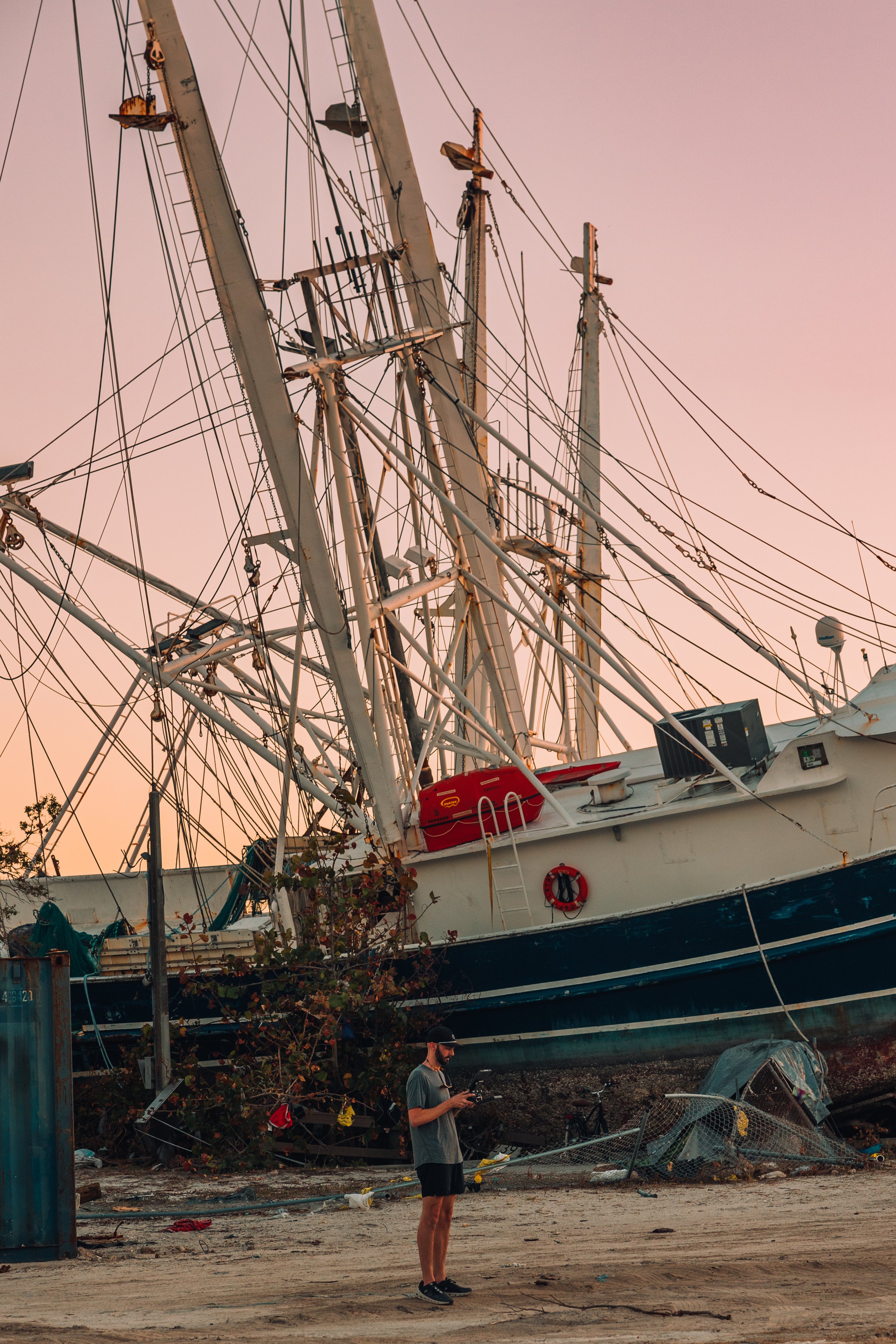 shrimping boats on the land after Hurricane Ian damage in Fort Lauderdale, Florida