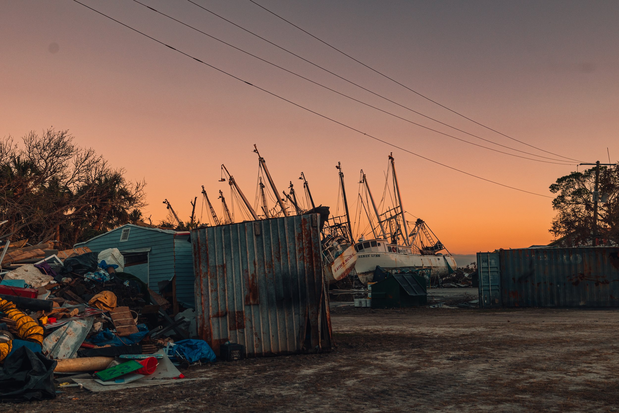 shrimping boats on the land after Hurricane Ian damage in Fort Lauderdale, Florida