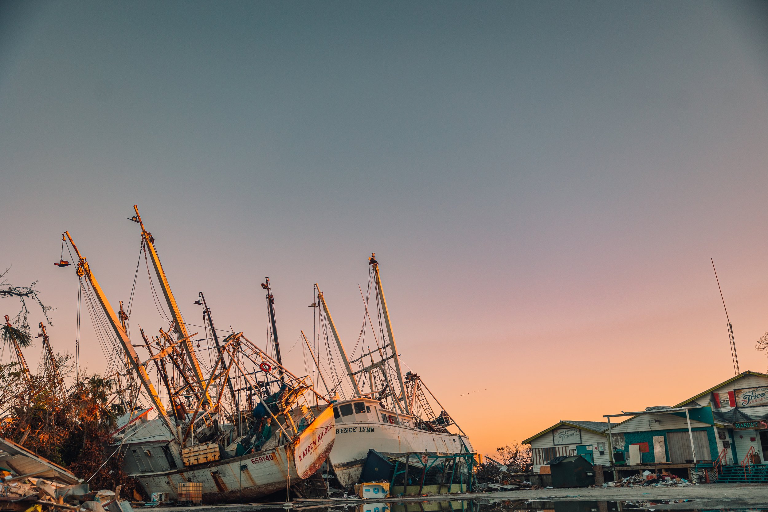 shrimping boats on the land after Hurricane Ian damage in Fort Lauderdale, Florida