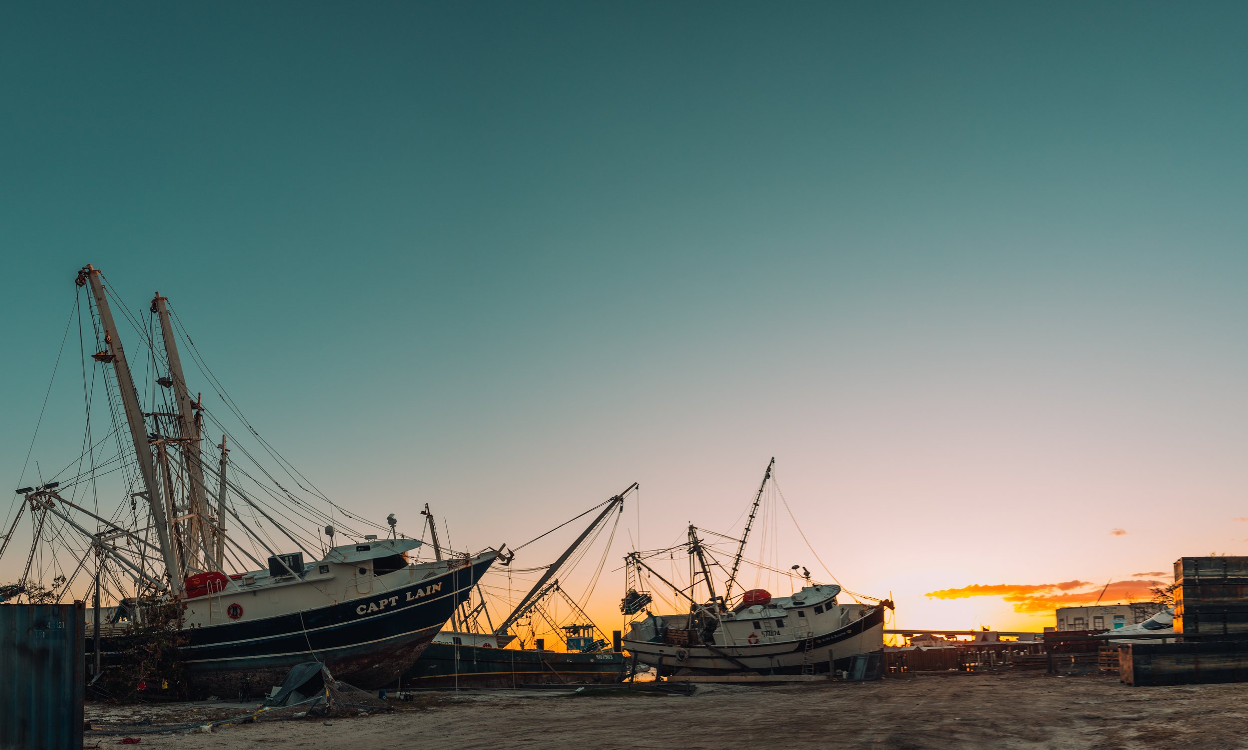 shrimping boats on the land after Hurricane Ian damage in Fort Lauderdale, Florida