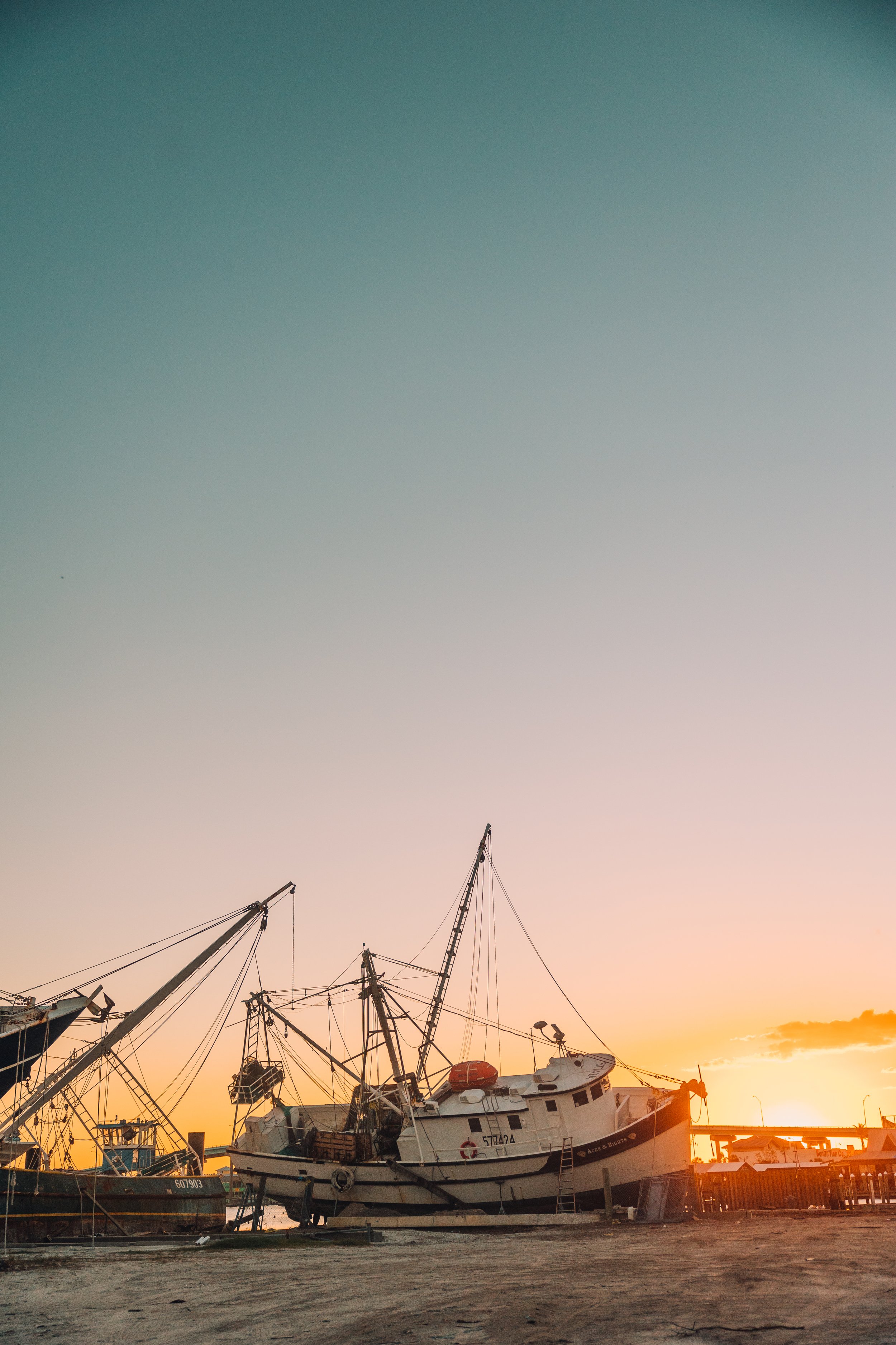 shrimping boats on the land after Hurricane Ian damage in Fort Lauderdale, Florida