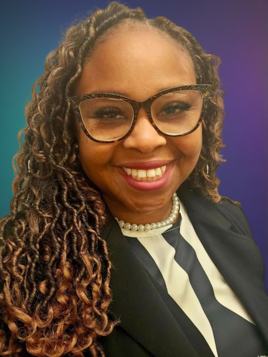 Smiling woman with long curly hair, glasses with tortoiseshell frames, a pearl necklace, and a black-and-white striped blouse, against a blue gradient background.