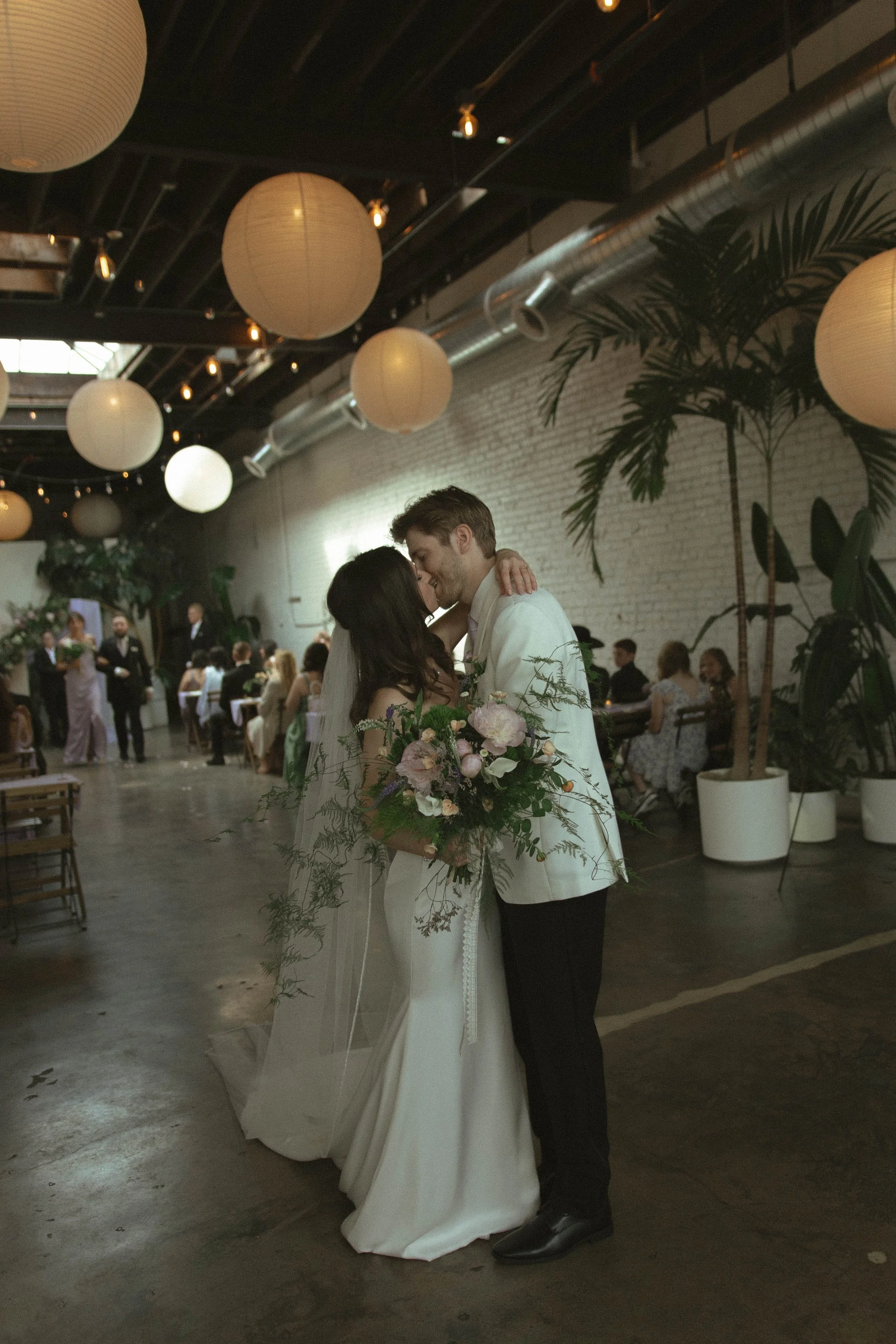 Tulsa Oklahoma wedding photographer capturing a wedding ceremony at The Canopy