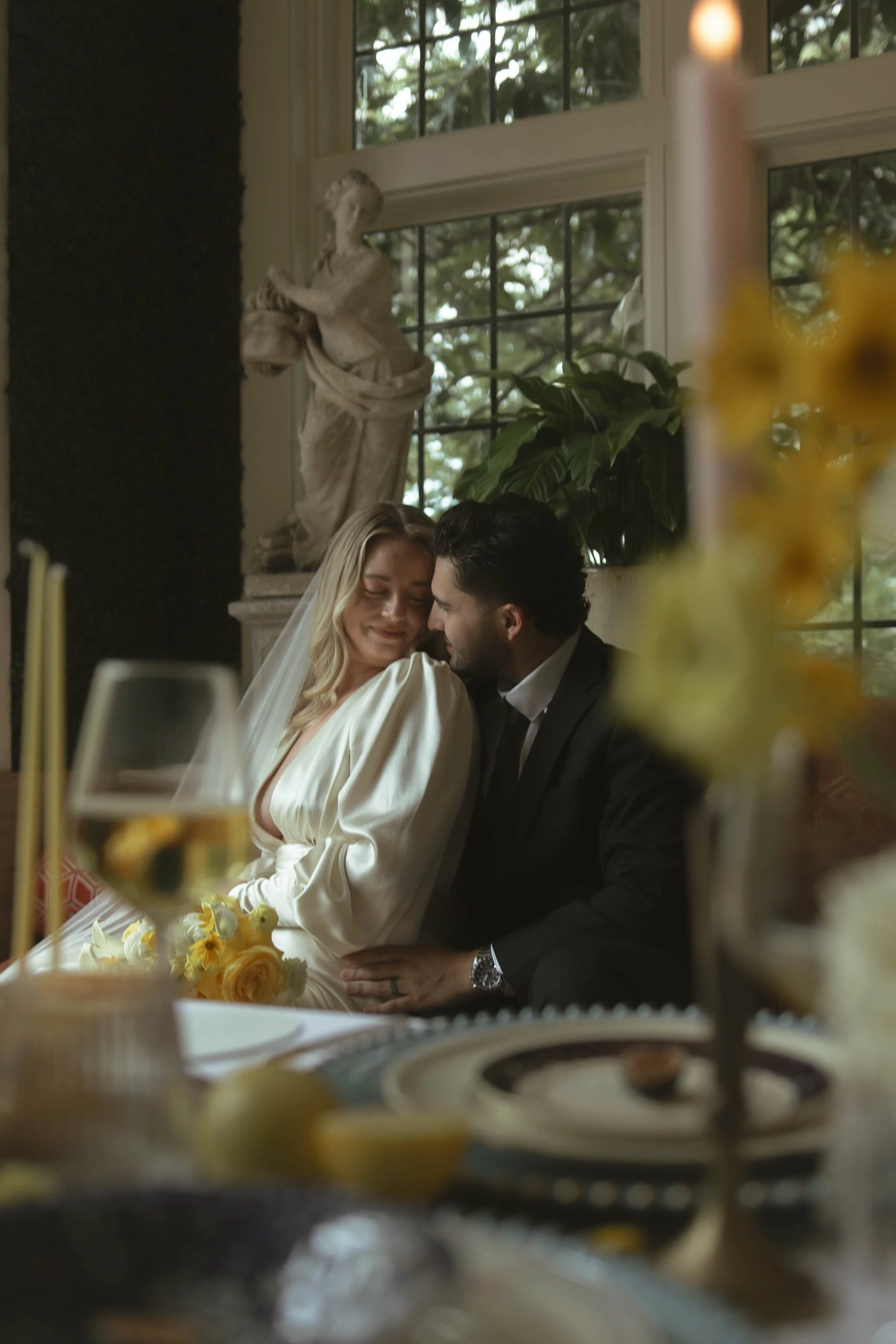 Tulsa Oklahoma wedding photographer documenting a quiet indoor reception moment at Harwelden Mansion
