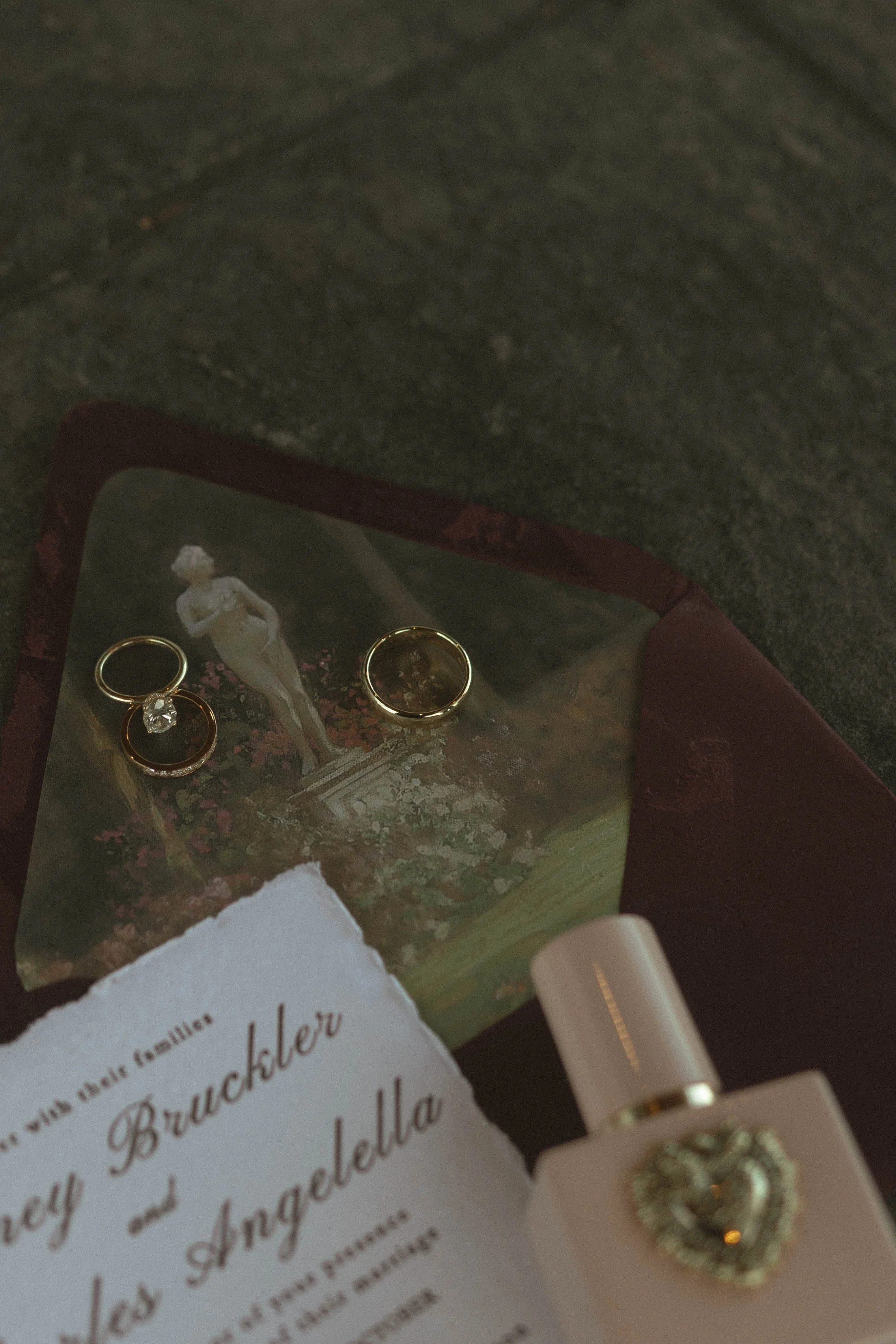 Tulsa Oklahoma wedding photographer capturing wedding ring and invitation details at Glass Chapel