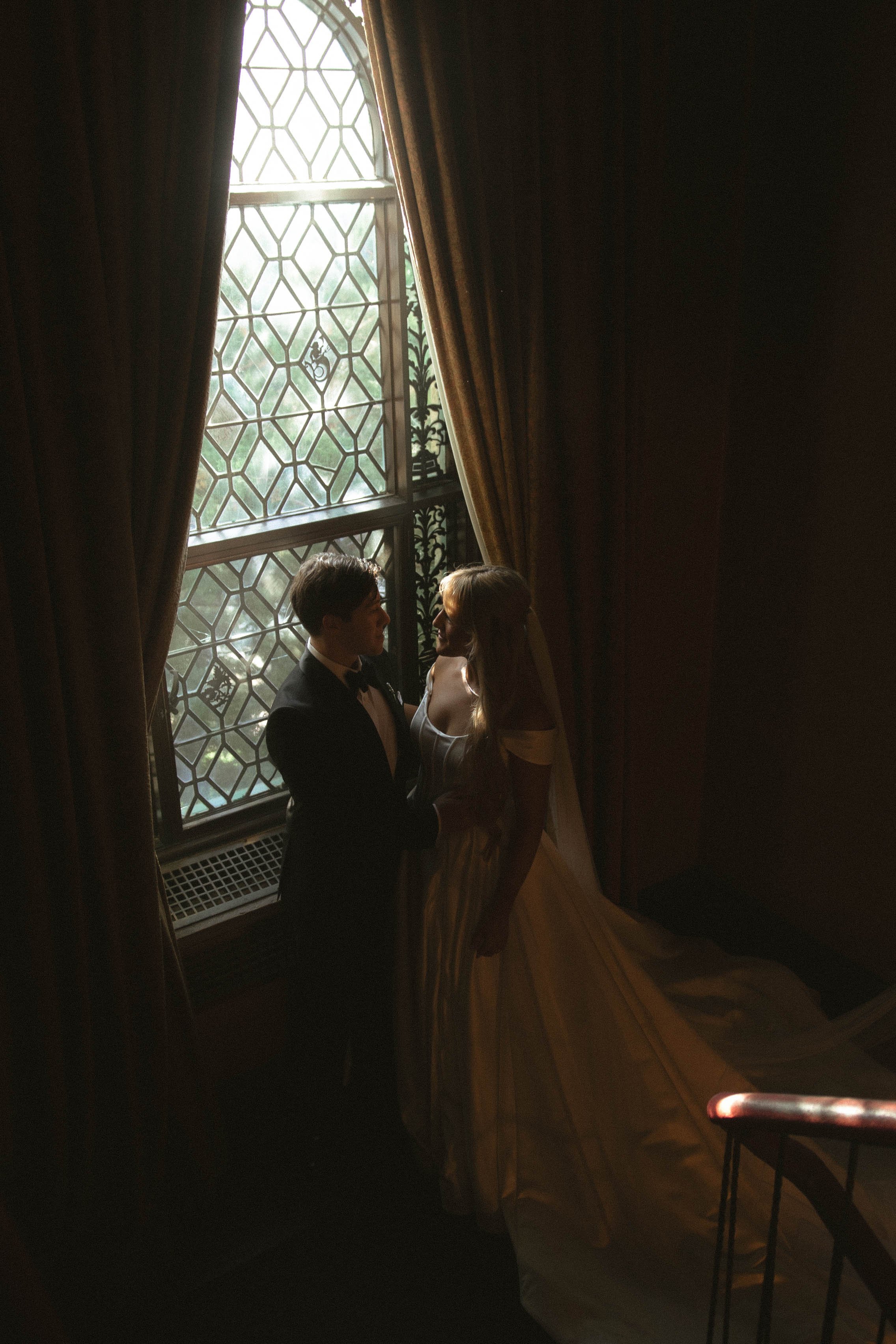 Tulsa Oklahoma wedding photographer photographing a romantic indoor portrait at Dresser Mansion in Tulsa