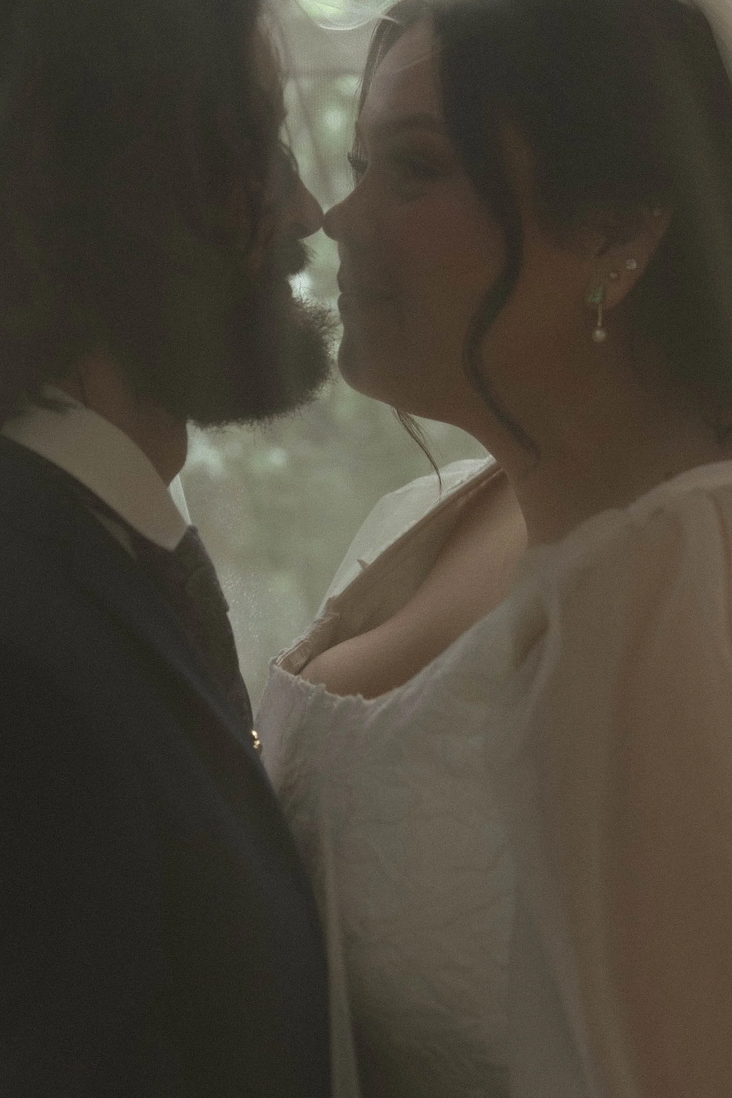 Tulsa Oklahoma wedding photographer documenting a quiet, intimate moment under the veil at Glass Chapel