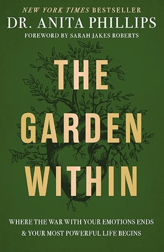 The book cover for 'The Garden Within' by Dr. Anita Phillips features a green background with an illustration of a tree with deep roots. The title is in large, peach-colored letters, and the author's name appears at the top. The subtitle and additional text are below the tree illustration.