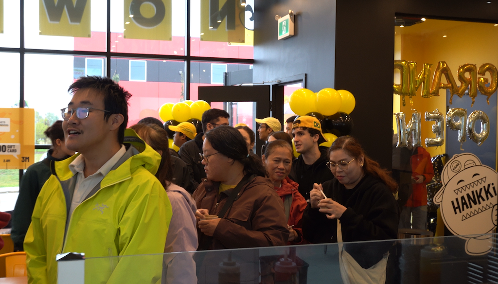 Guests celebrating the HANKKi Highfield grand opening in Calgary
