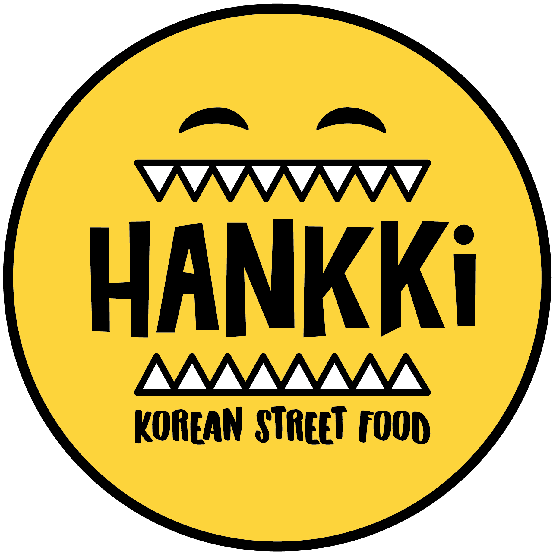 Yellow circular sign featuring a stylized cartoon face with sharp teeth, Chinese characters, and the English words 'Korean Street Food'.