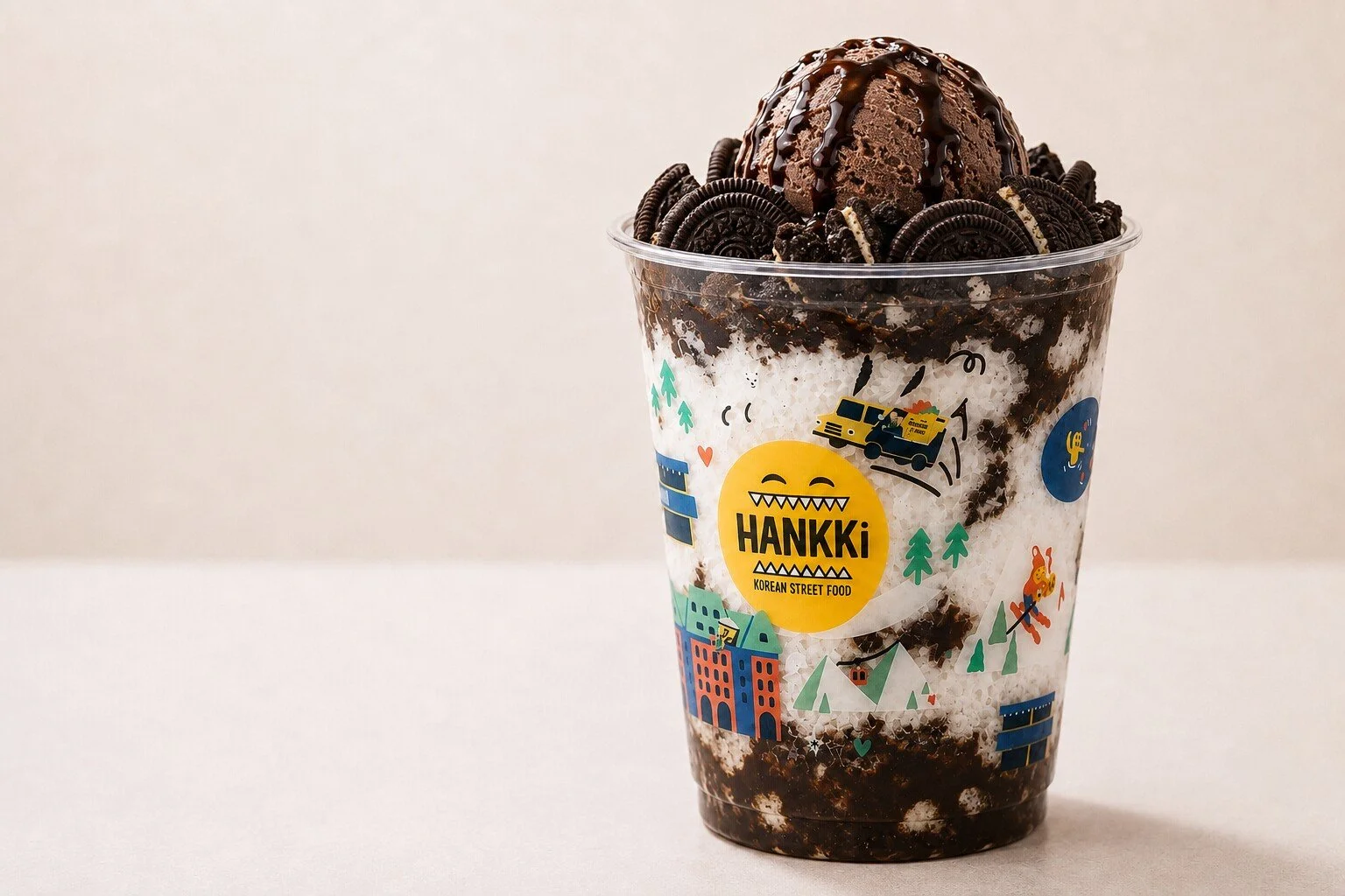 HANKKi Oreo Bingsu topped with chocolate ice cream, Oreo cookies and chocolate sauce over shaved milk ice