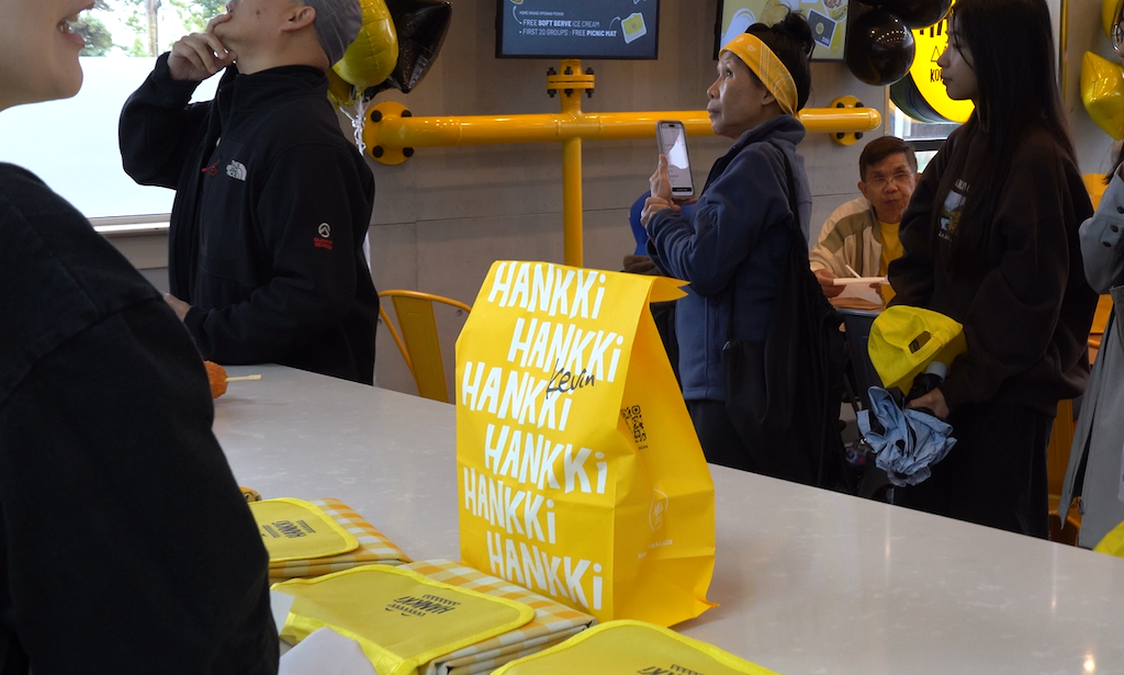 HANKKi Highfield grand opening guests and picnic mat giveaways inside the Calgary restaurant