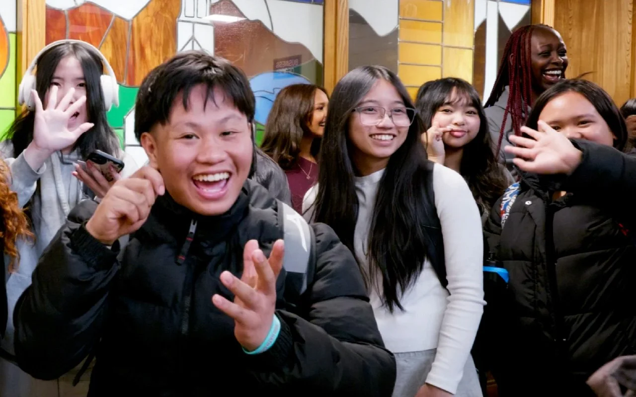 Father Lacombe High School students smiling and celebrating during HANKKi’s visit
