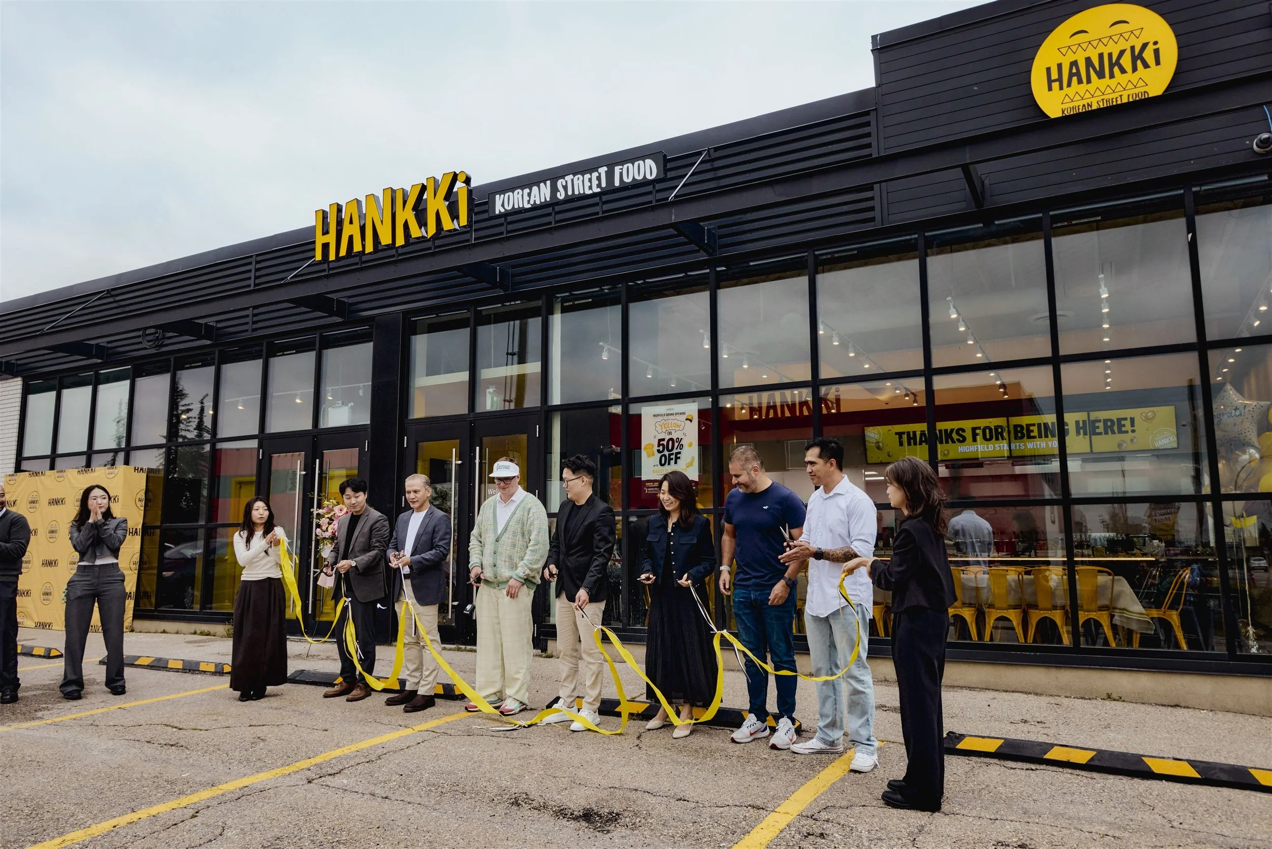 HANKKi Highfield team gathering outside the Calgary restaurant before the grand opening