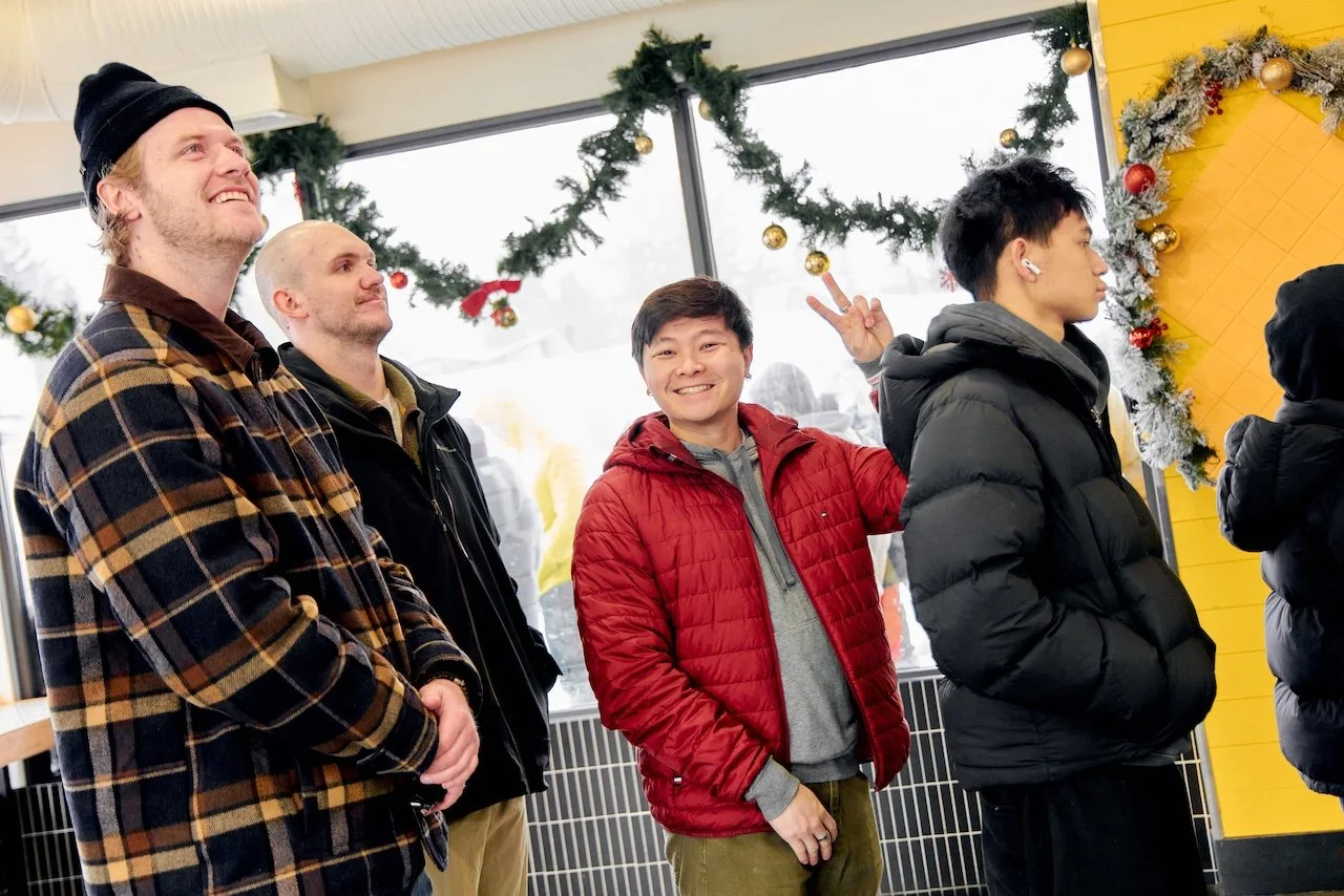 Customers inside Hankki Acadia, a welcoming local restaurant in Acadia Calgary