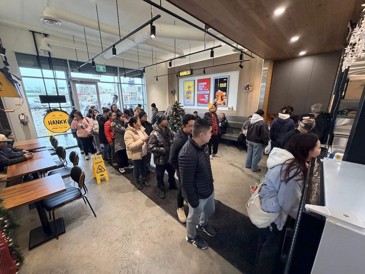 Busy Hankki dining room during Charity Day 2025 with customers participating in community event
