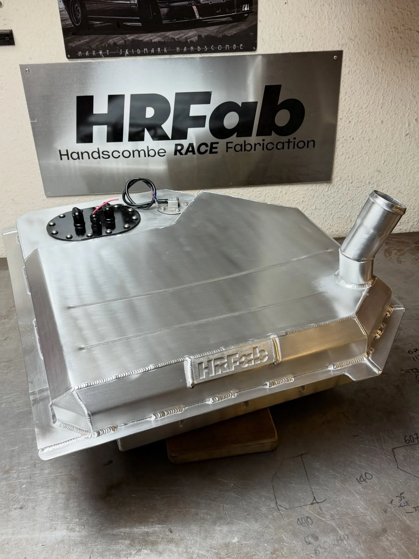 Freshly finished off custom fuel tank for a BMW 2002 running a Honda F20C swap, built to drop right into the factory location.

Running a Walbro GST450 pump mounted in an internal collector box to prevent fuel surge, an integrated level sender, and A
