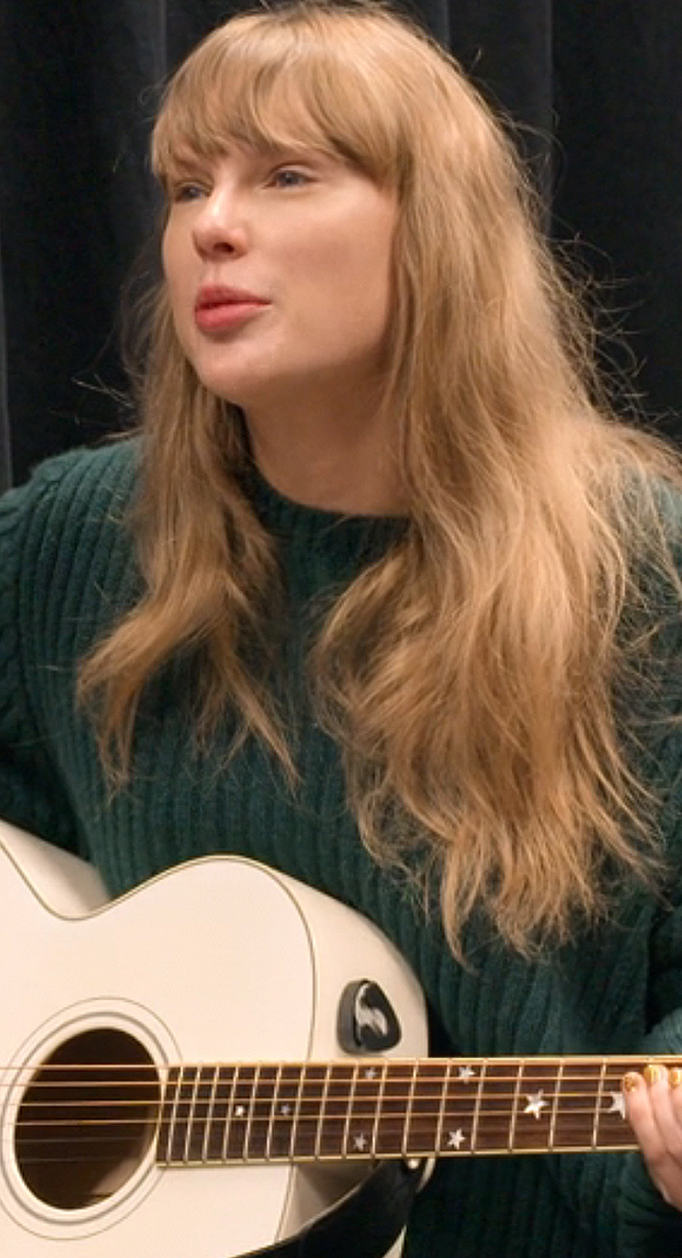 Taylor Swift rehearses an acoustic performance with Gracie Abrams on the Eras Tour in green Stella McCartney knit dress.