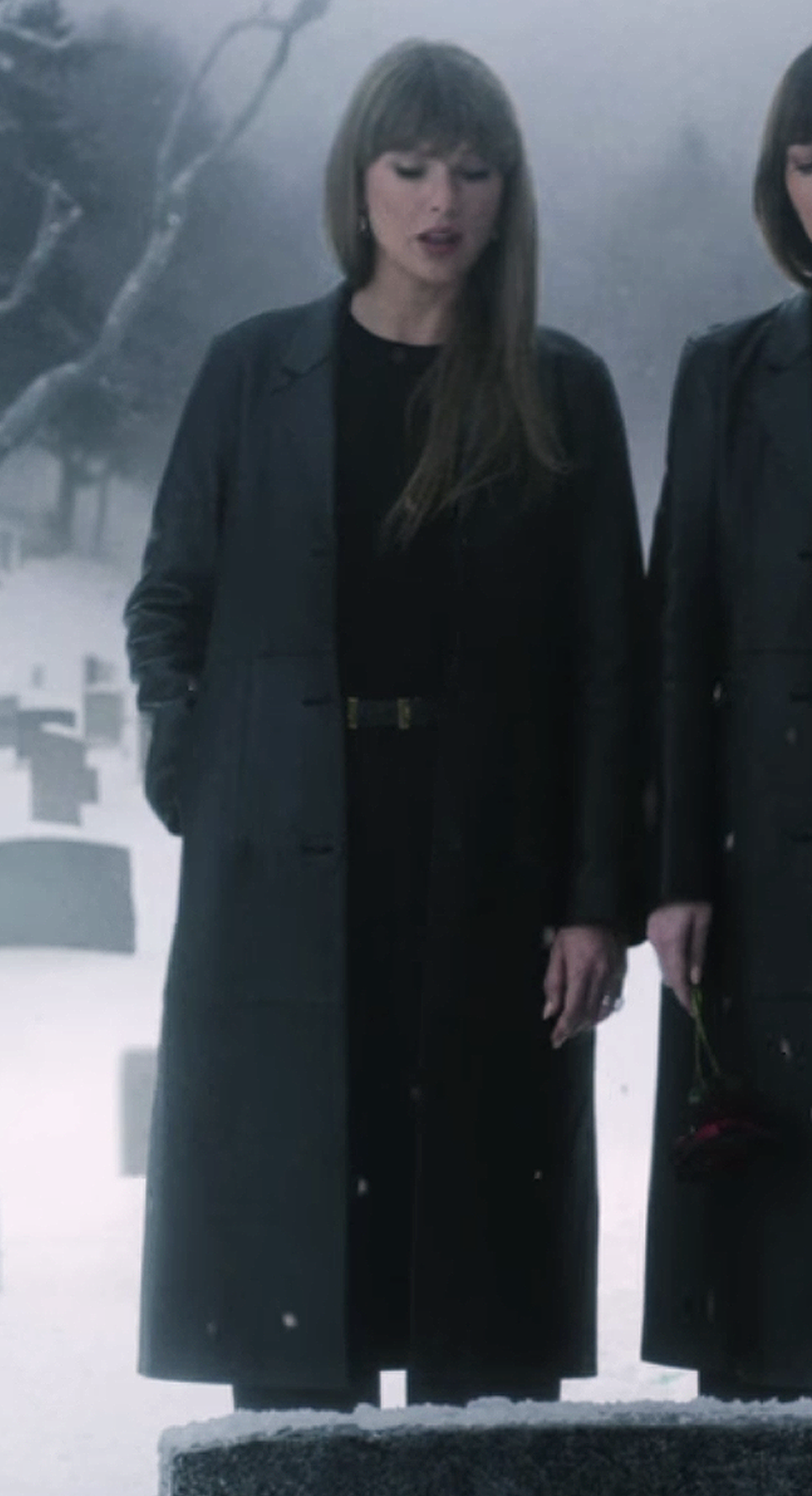 Taylor Swift in Toteme black leather jacket for "Patient Zero" music video with Dakota Johnson.