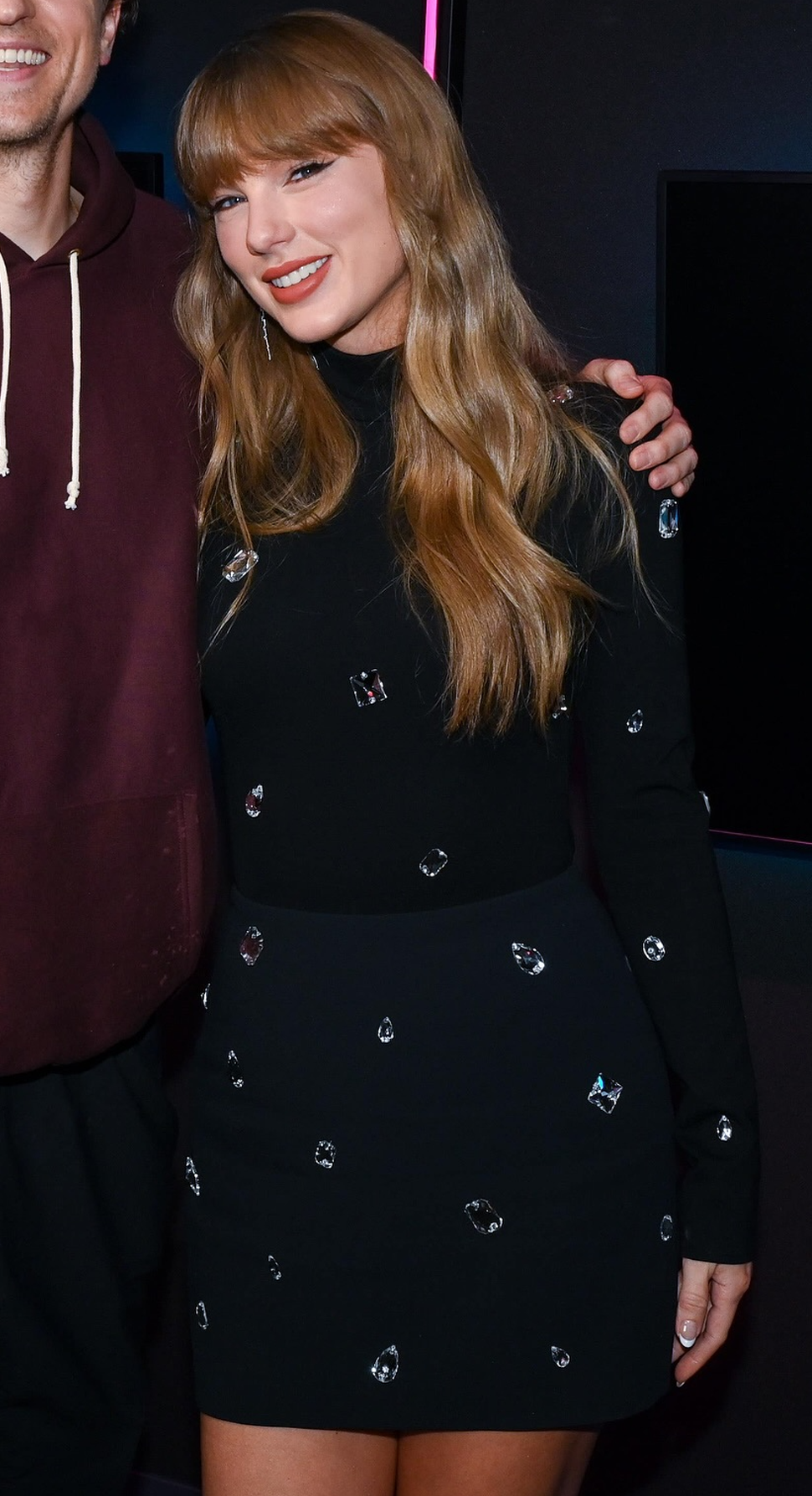 Taylor Swift appears on BBC Radio 1 wearing a black crystal embellished bodysuit and skirt as part of press for The Life of a Showgirl.