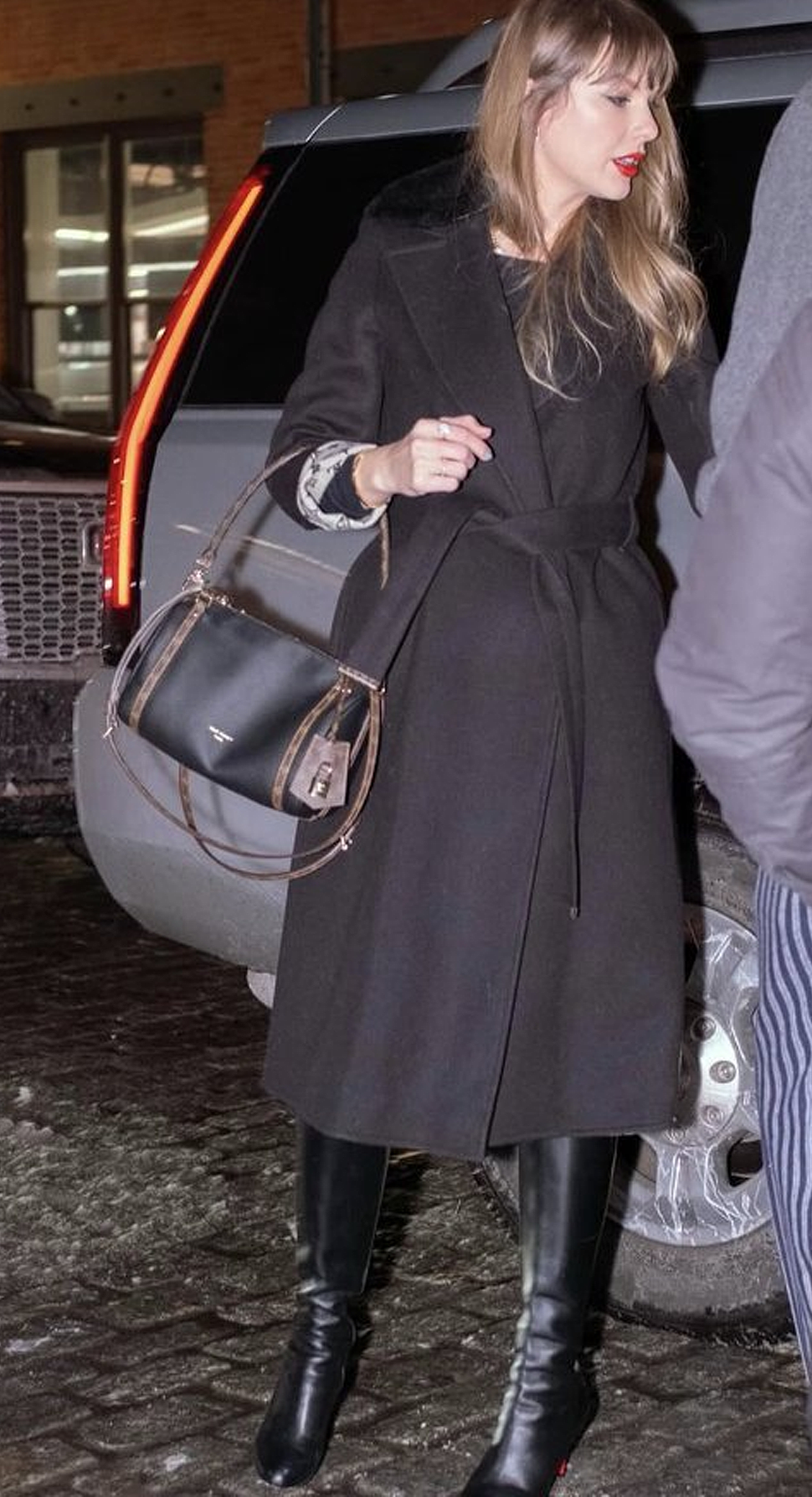 Taylor Swift in Louis Vuitton while out to dinner in New York City with Travis Kelce.