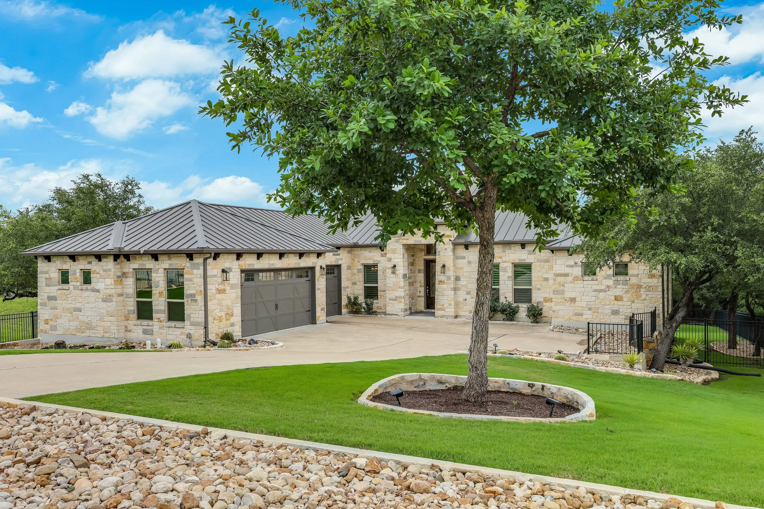 Oversized three-car garage with epoxy floor at 328 Ringtail Stream Drive