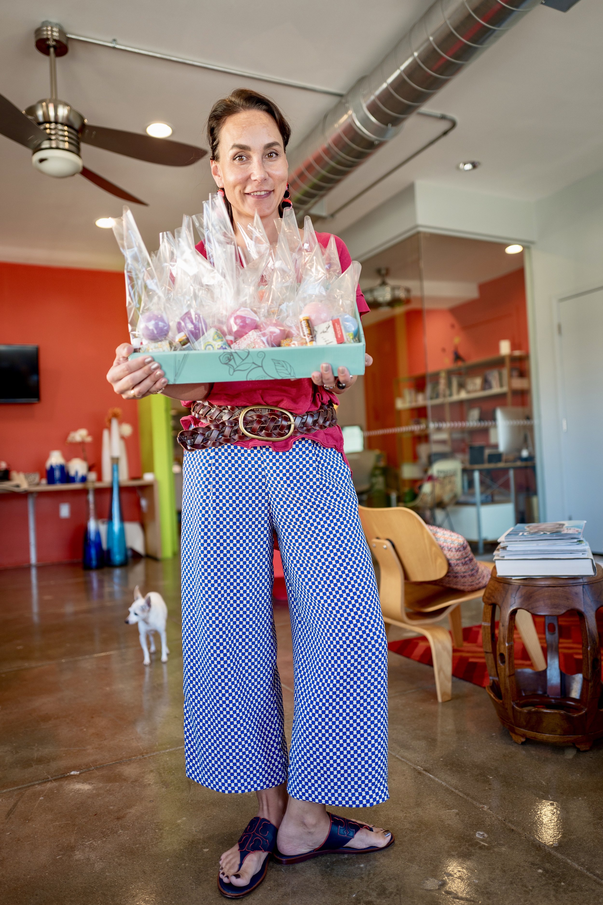 Diana Roberts carrying client gifts
