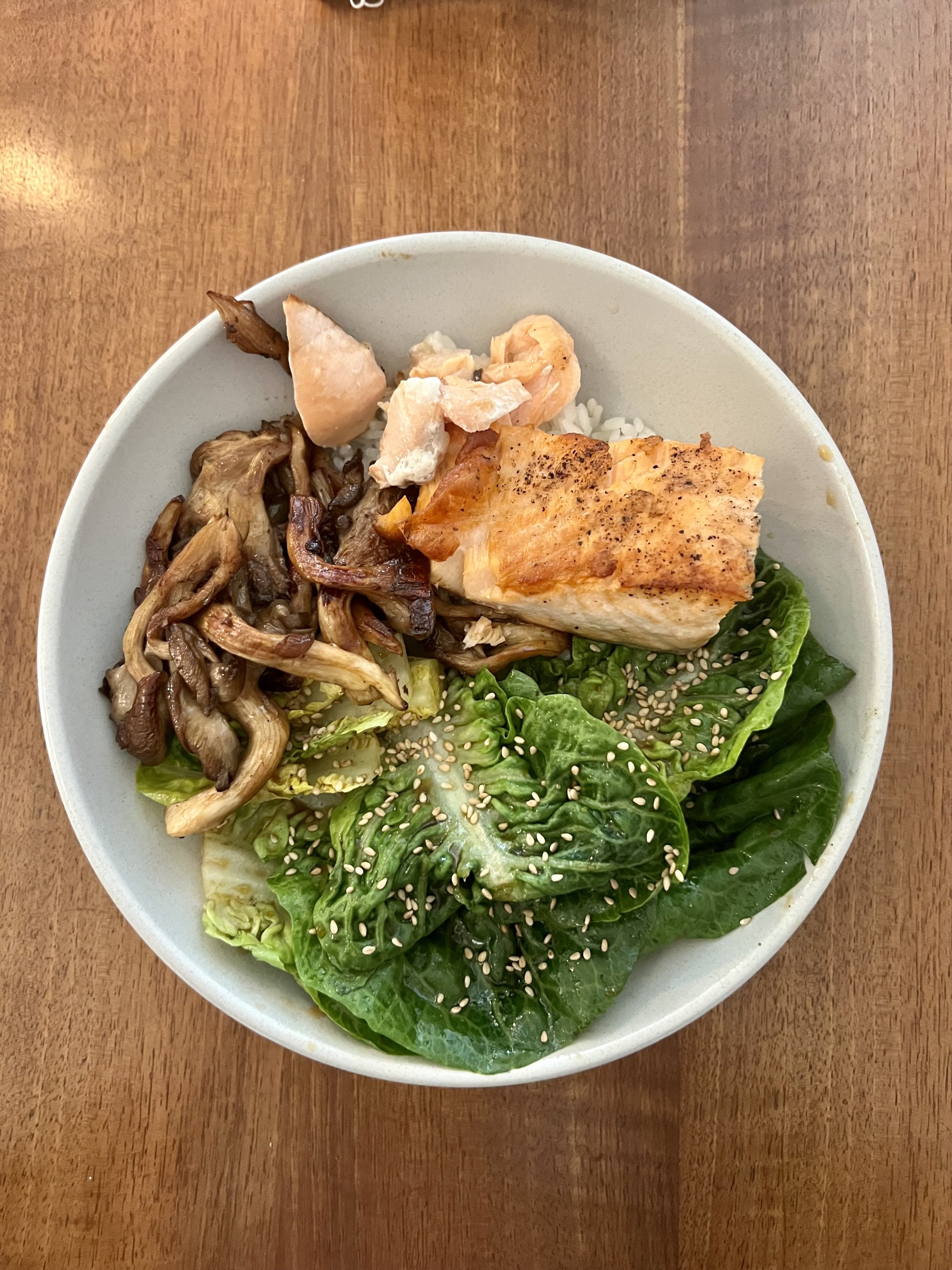 Pan-Seared Salmon, Tamari Oyster Mushrooms, Little Gems, Sesame Dressing & Sushi Rice