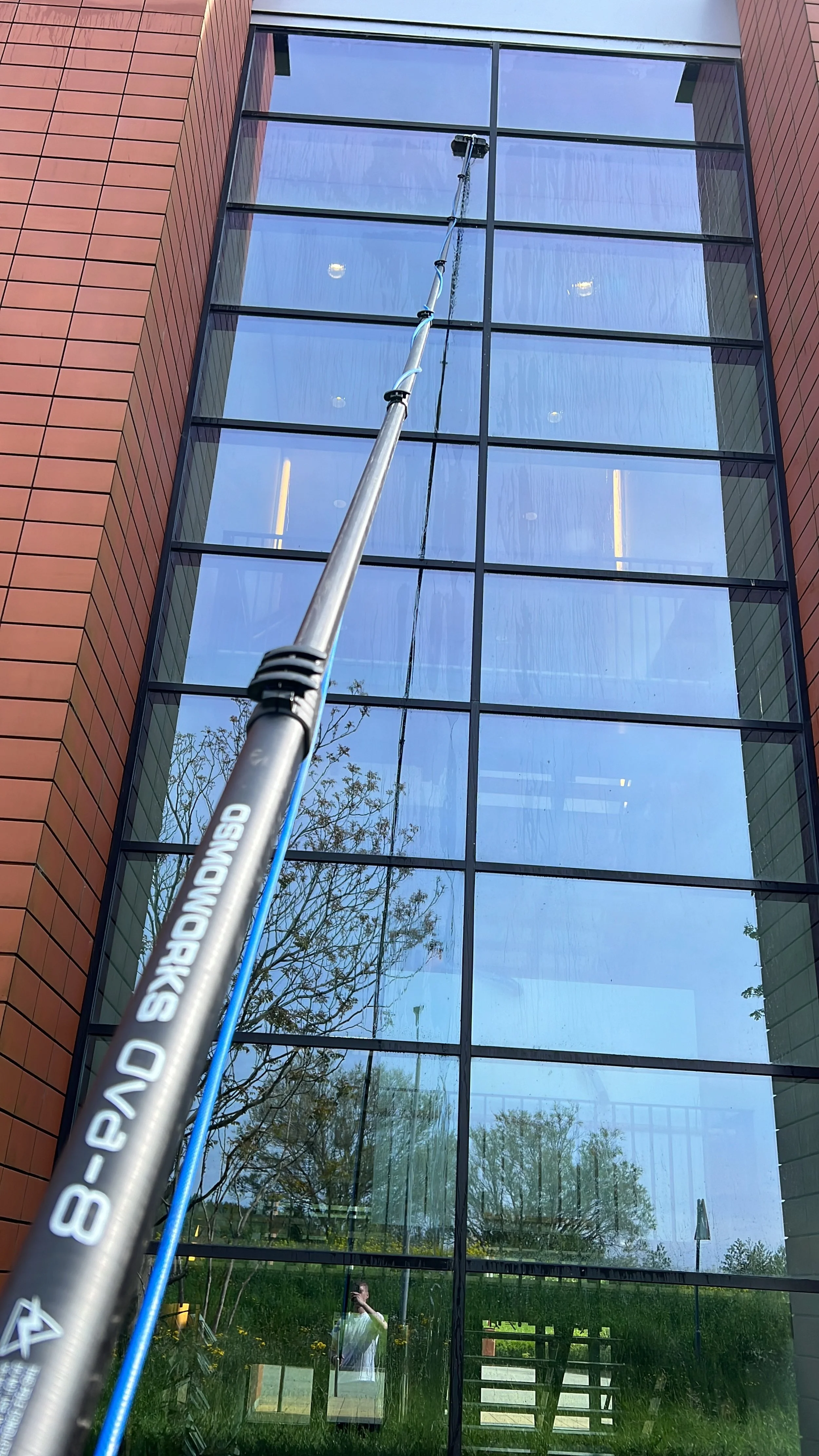 Telescopische glasbewassing