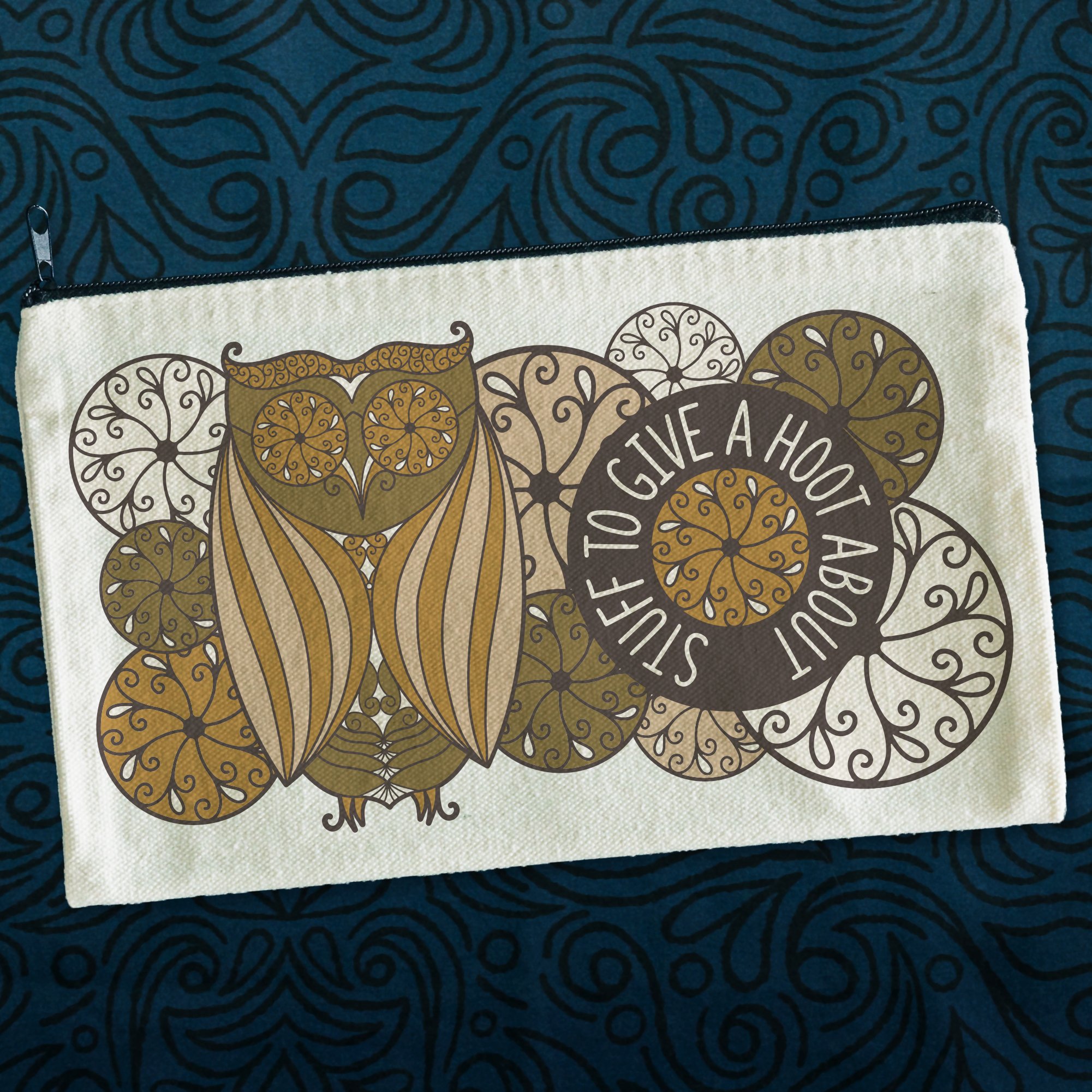 24-050 Hoot About Angled on blue fabric.jpg