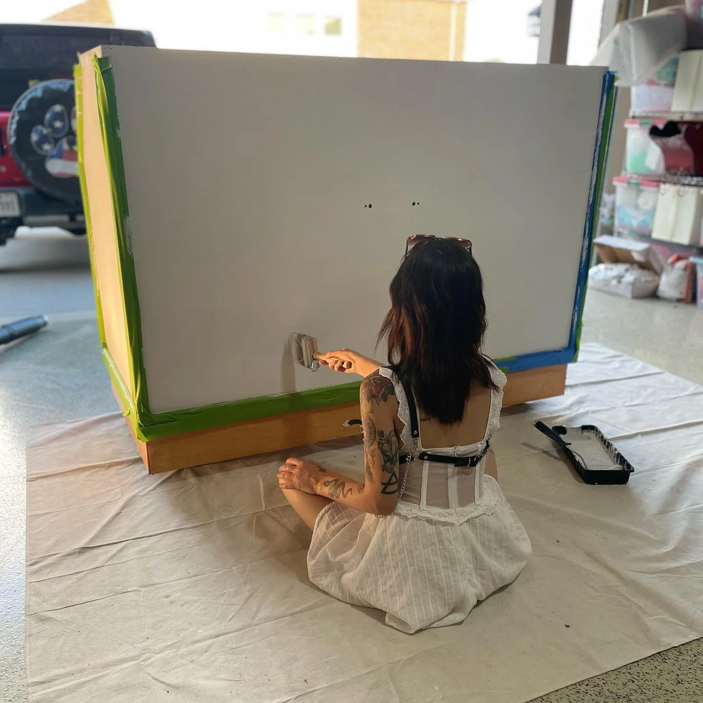 Once we had the bar sanded down and ready for paint we decided to balance the rustic look with some elegance and went with a nice eggshell white. The frame had some 1/4&rdquo; plywood that made it easy to apply the paint to. It came together perfectl