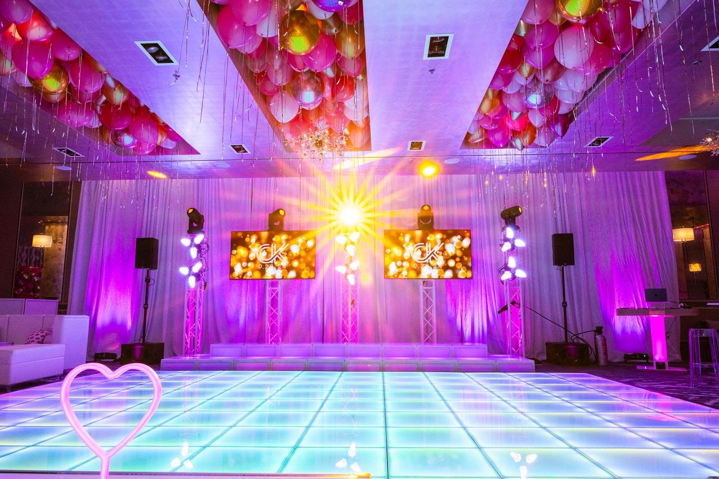 Carsyn&rsquo;s Bat Mitzvah at The Ritz dazzled with a glowing LED dance floor, spinning flower light effects, video screens &amp; dynamic lighting that energized the room ⚡️ 

sleek white lounge, bright pink pillows &amp; heart-shaped centerpieces ad