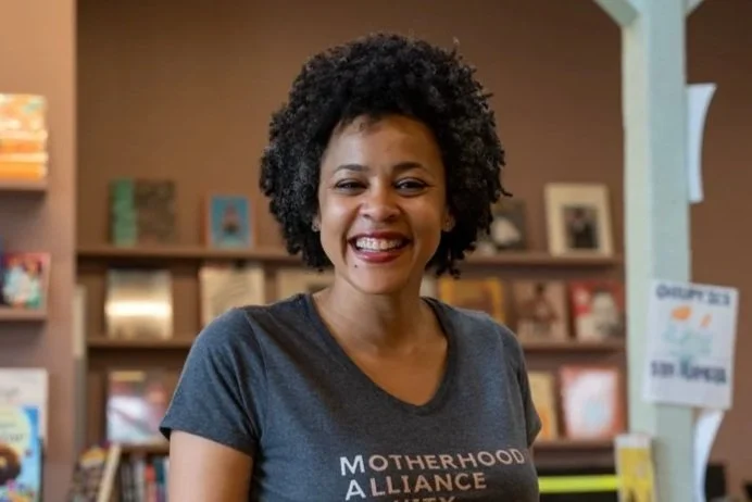 Mom smiling at bookstore