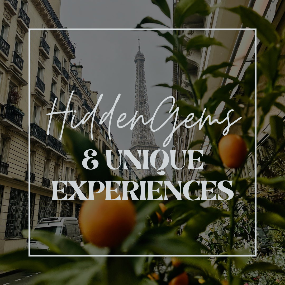 View of the Eiffel Tower framed by Parisian buildings and orange fruits, overlaid with the text 'Hidden Gems & Unique Experiences.'