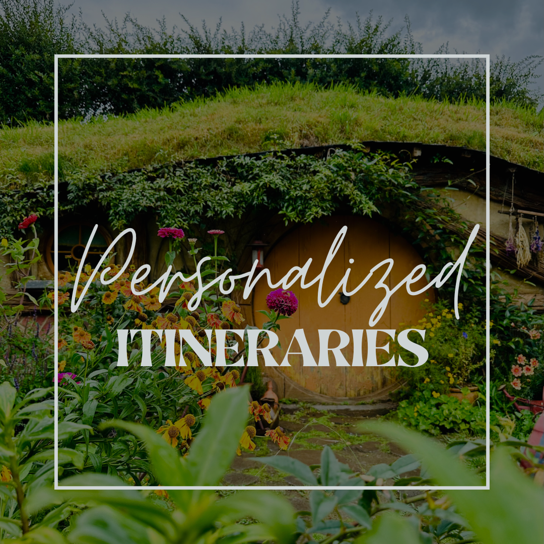 Whimsical hobbit house with a grassy roof, surrounded by lush greenery, colorful flowers, and a wooden round door. Overlay text reads 'Personalized Itineraries.'