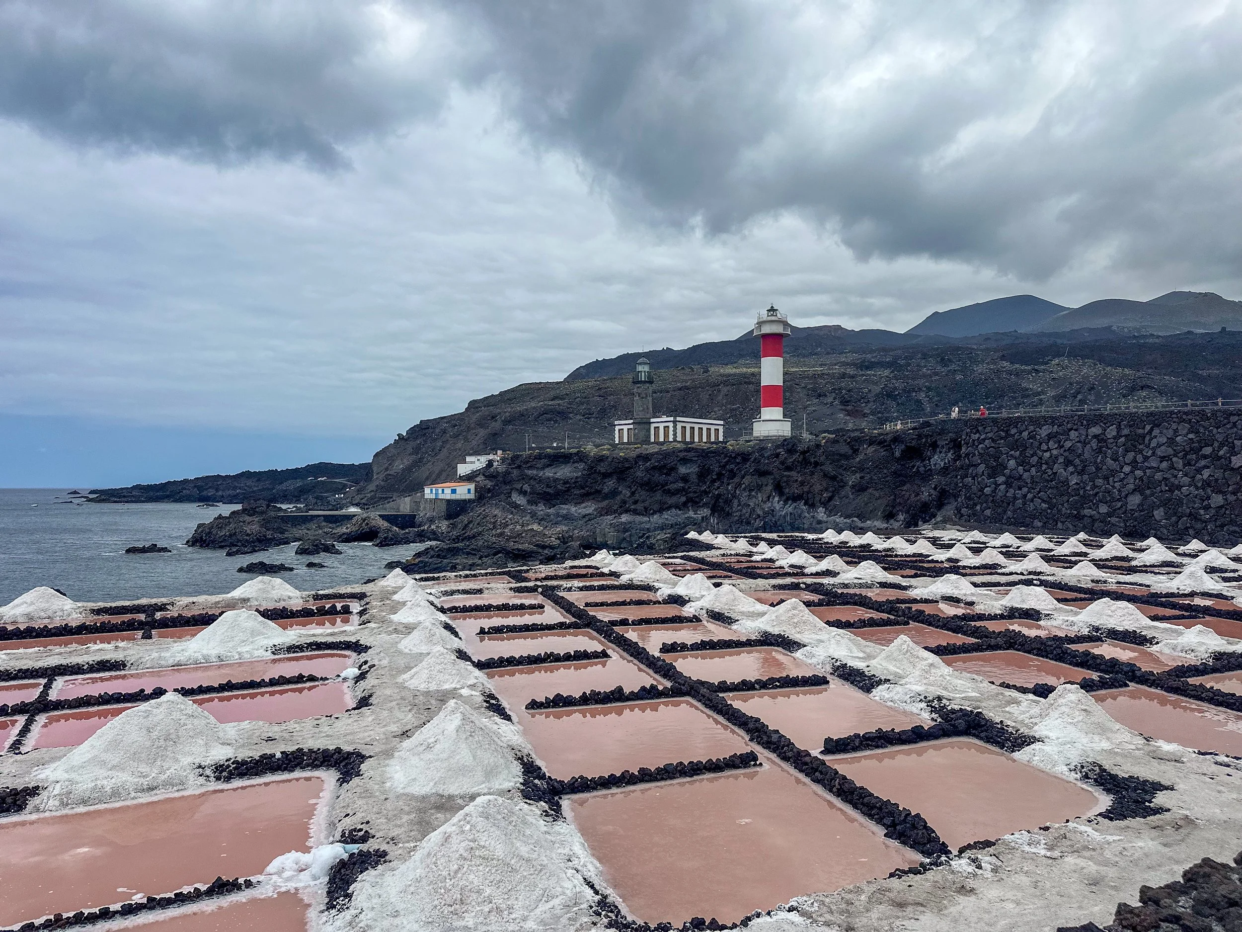 Salinas de fuencaliente in La Palma with volcanoes in the background.jpg