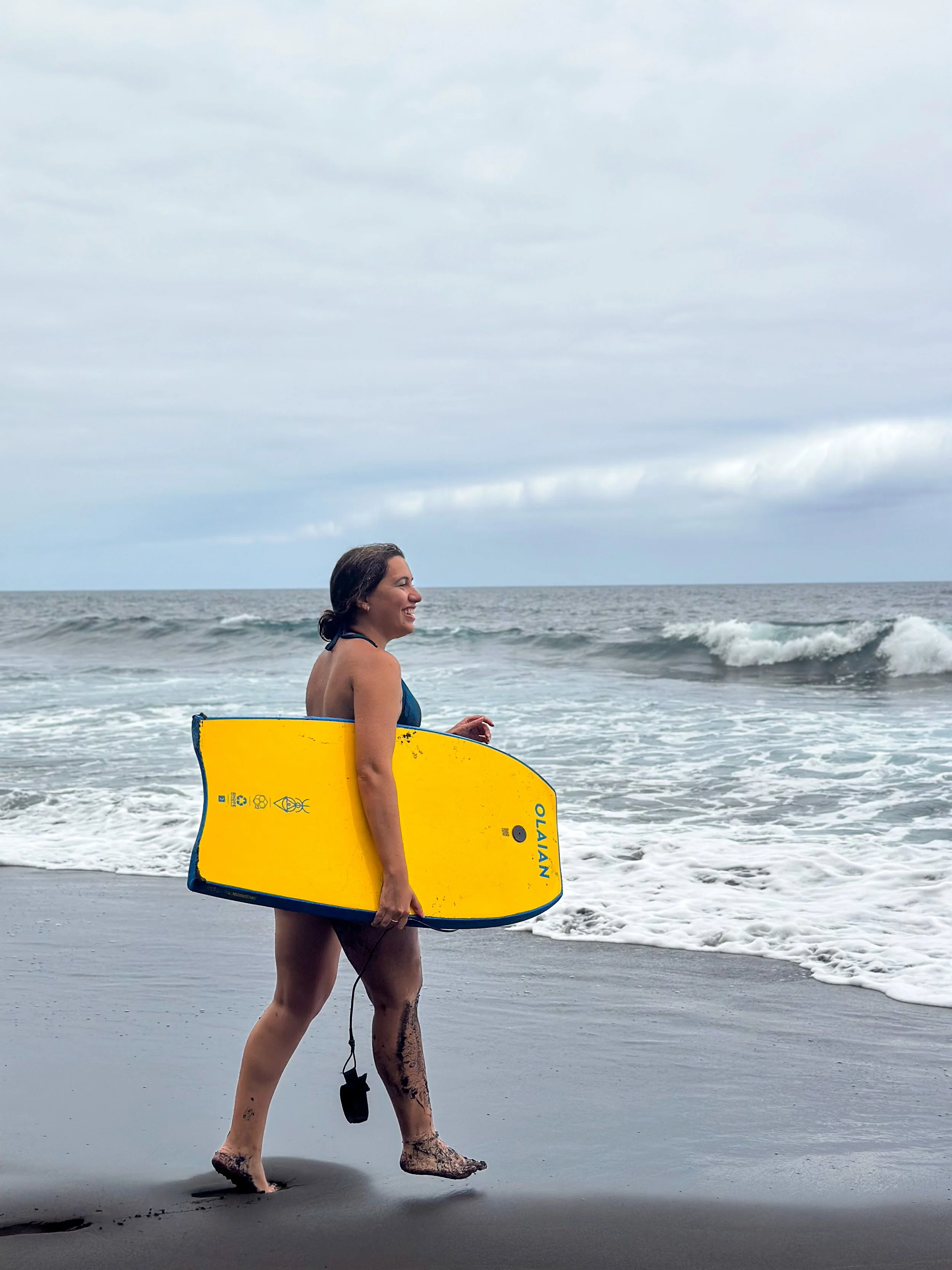 Carol body surfing in Playa los Patos in north Tenerife.jpg