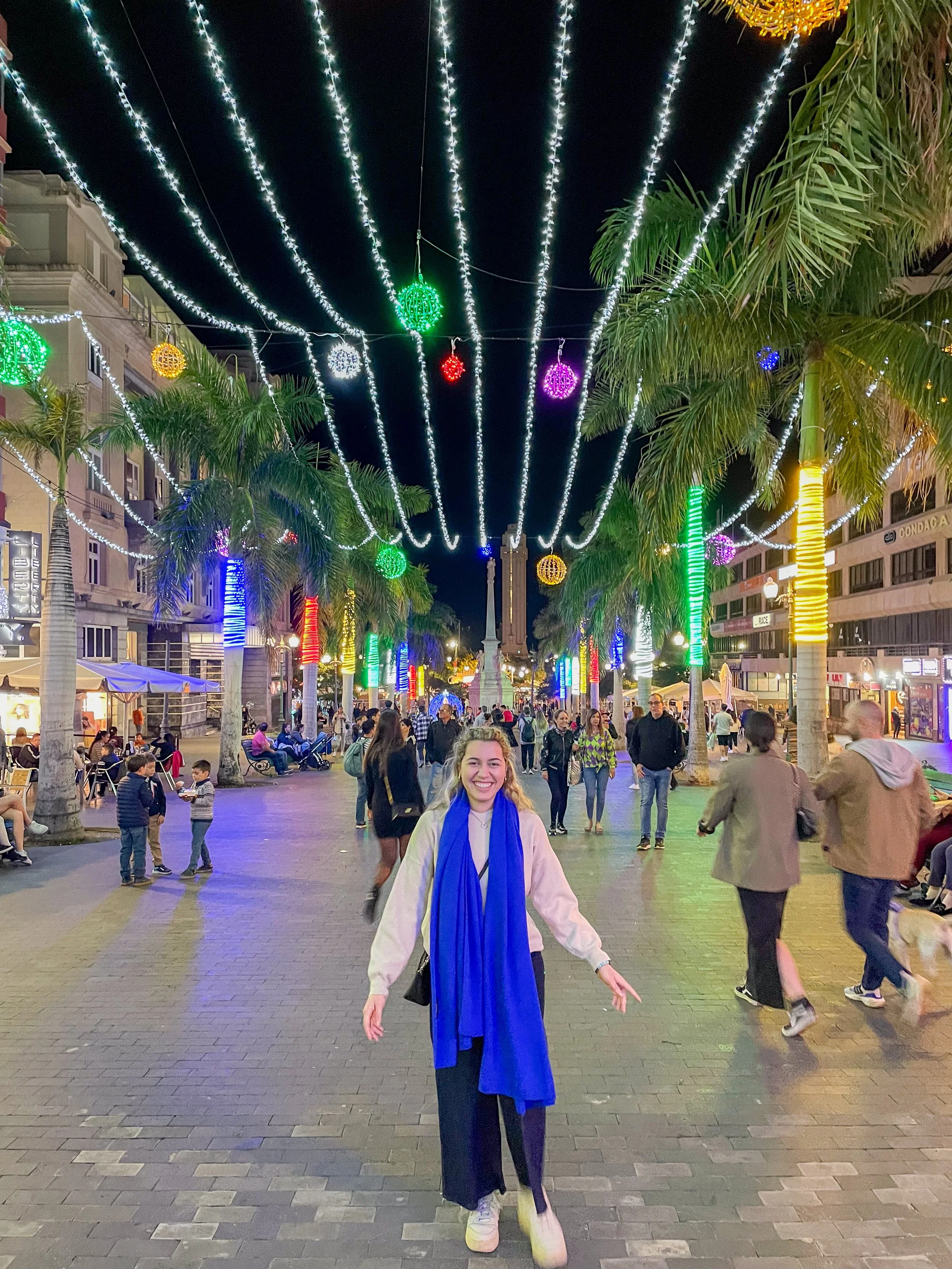 Carol in Santa Cruz de tenerife under colourful lights.jpg