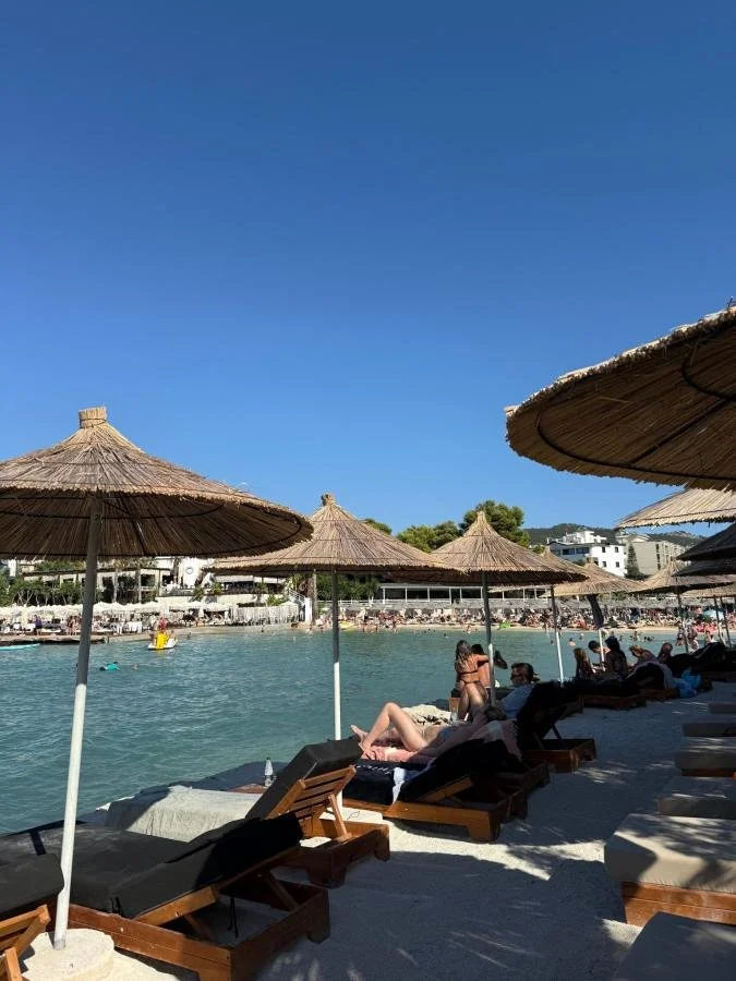Hotel Lula Ksamil Beach and sunbeds.jpg
