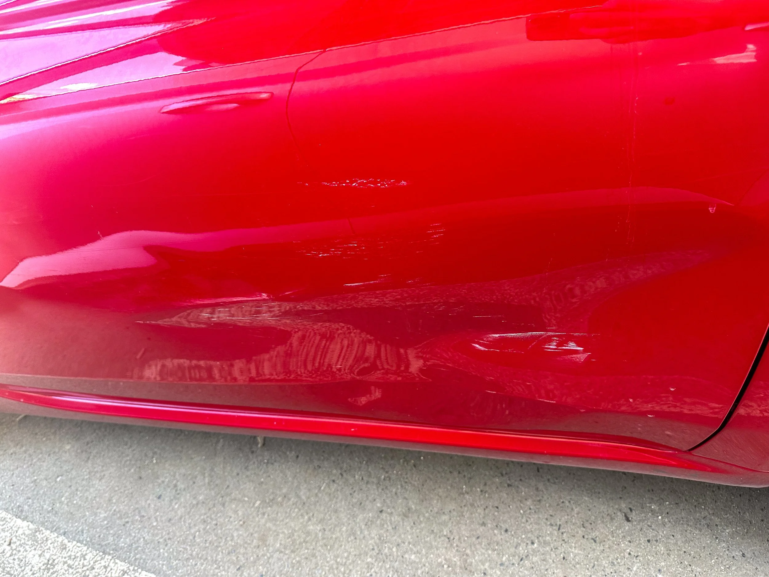 Scratched door on car rental at Tirana Airport.jpg