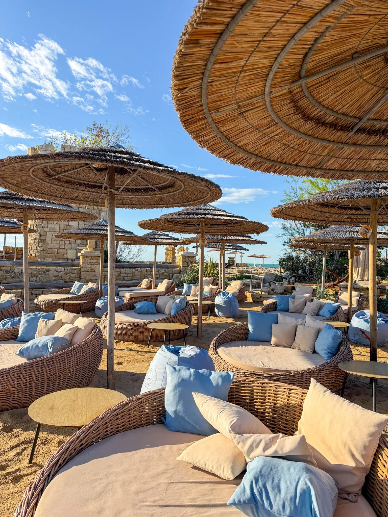 Plush sunbeds and umbrellas at Radjana beach bar, Varna, Bulgaria